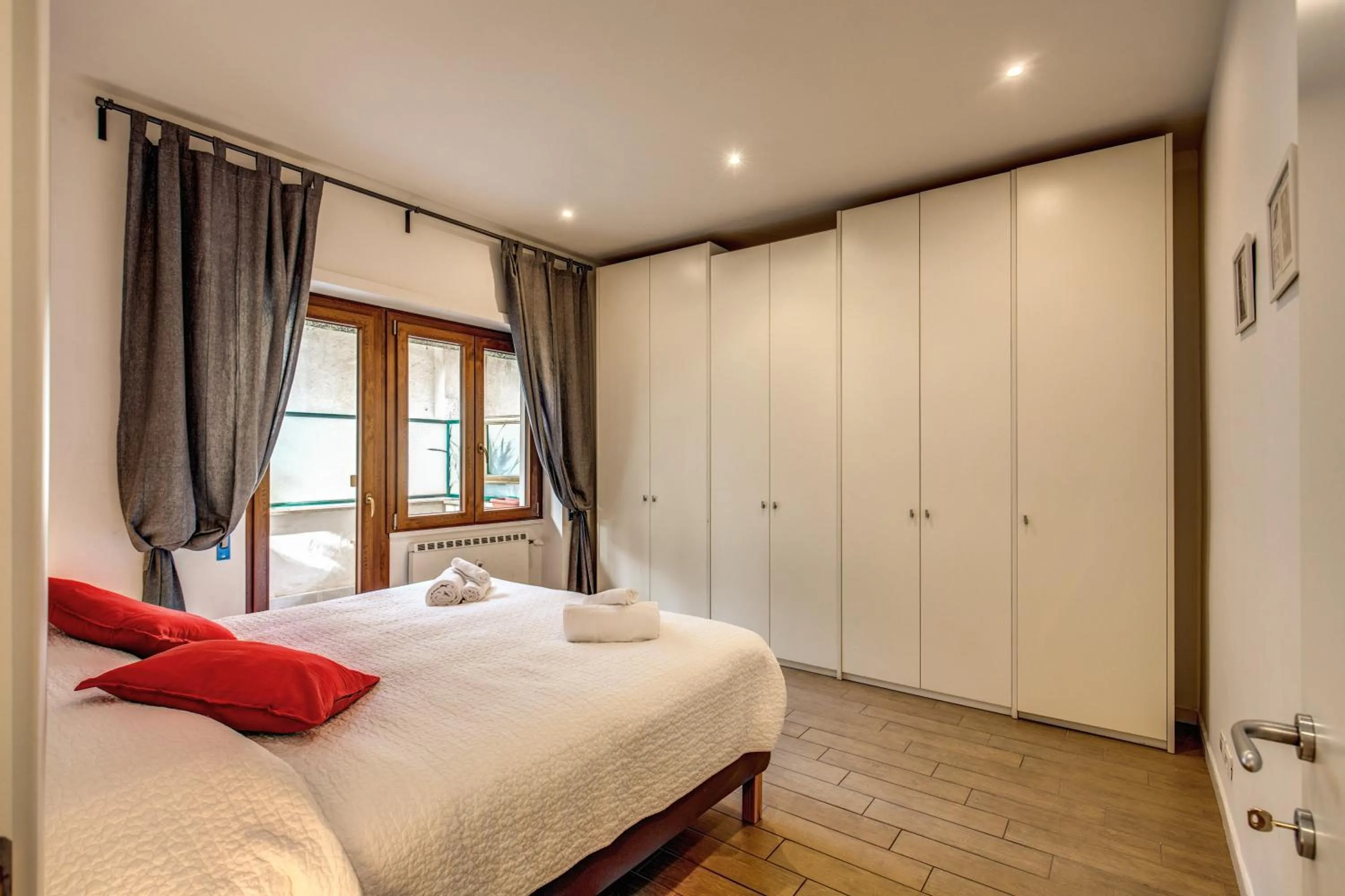 Bed in M&L Apartments - Ardesia Colosseo