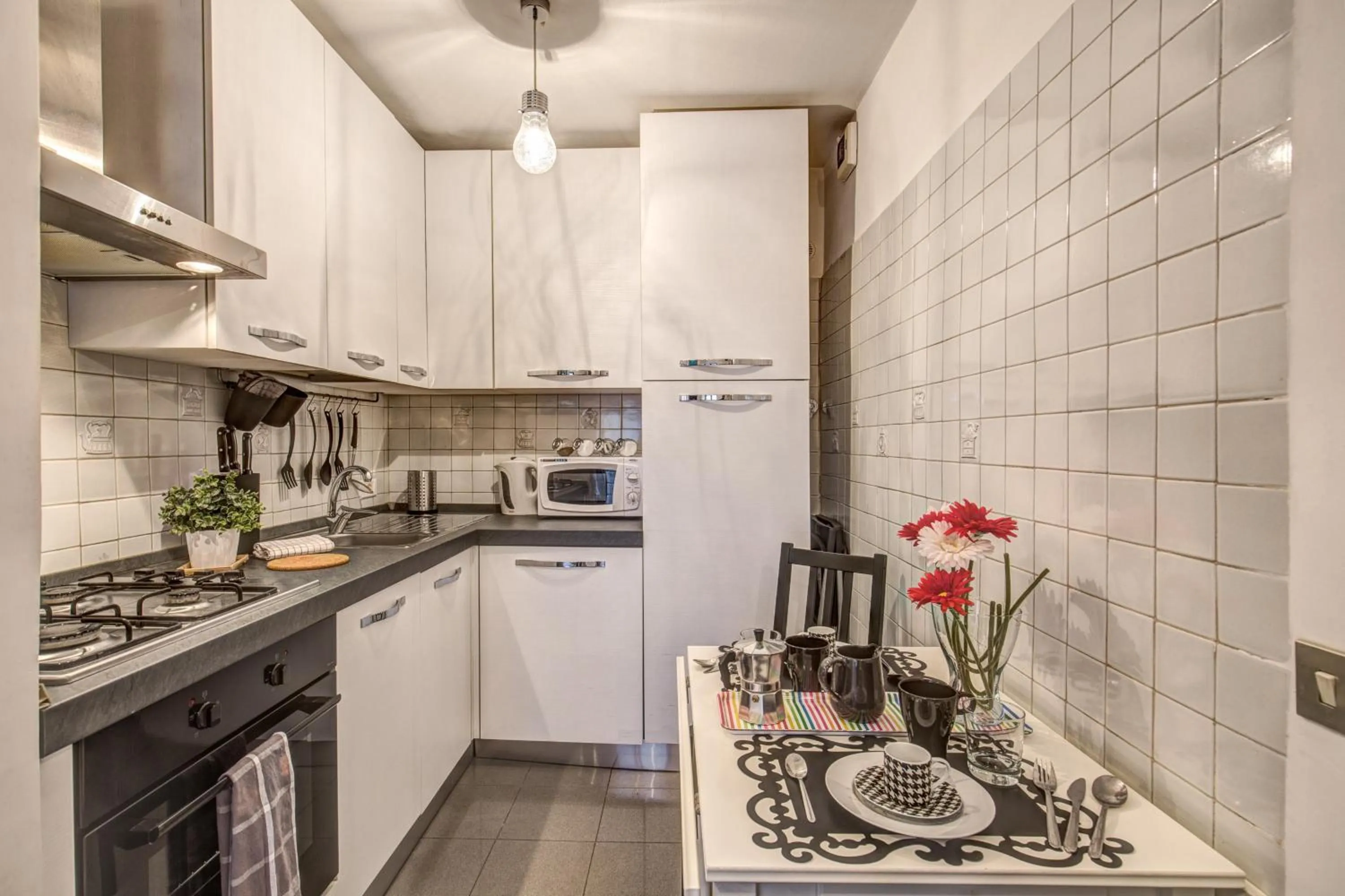 Kitchen or kitchenette in M&L Apartments - Ardesia Colosseo