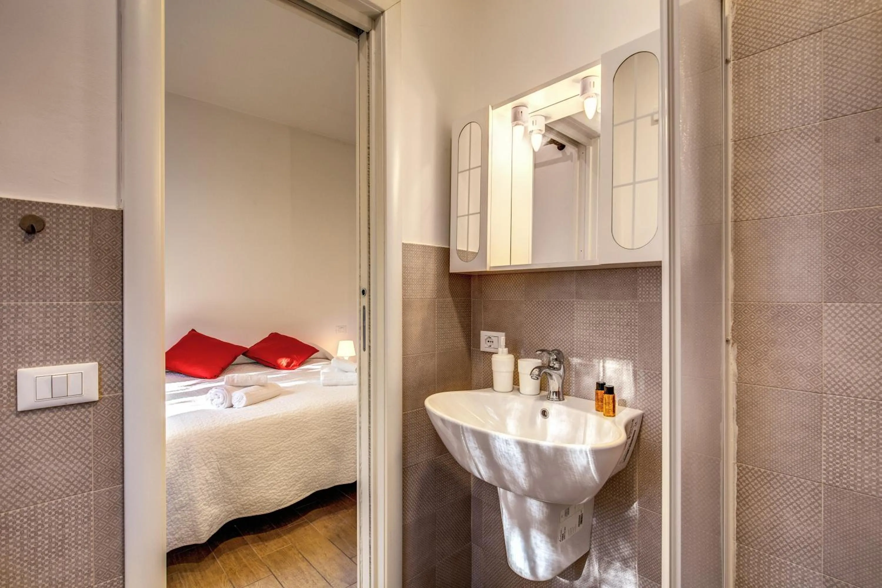 Bed in M&L Apartments - Ardesia Colosseo