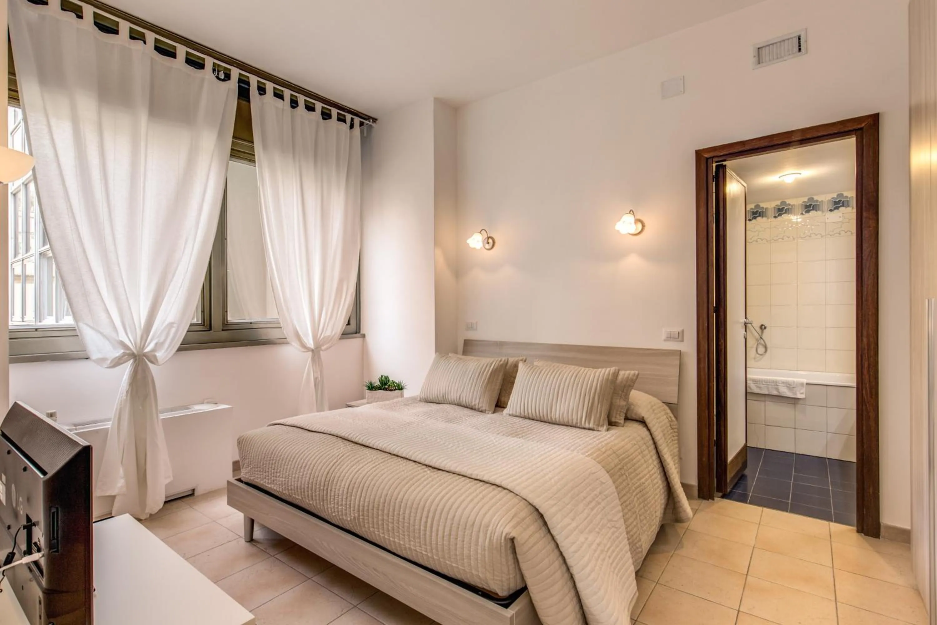 Bedroom, Bed in M&L Apartments - Ardesia Colosseo