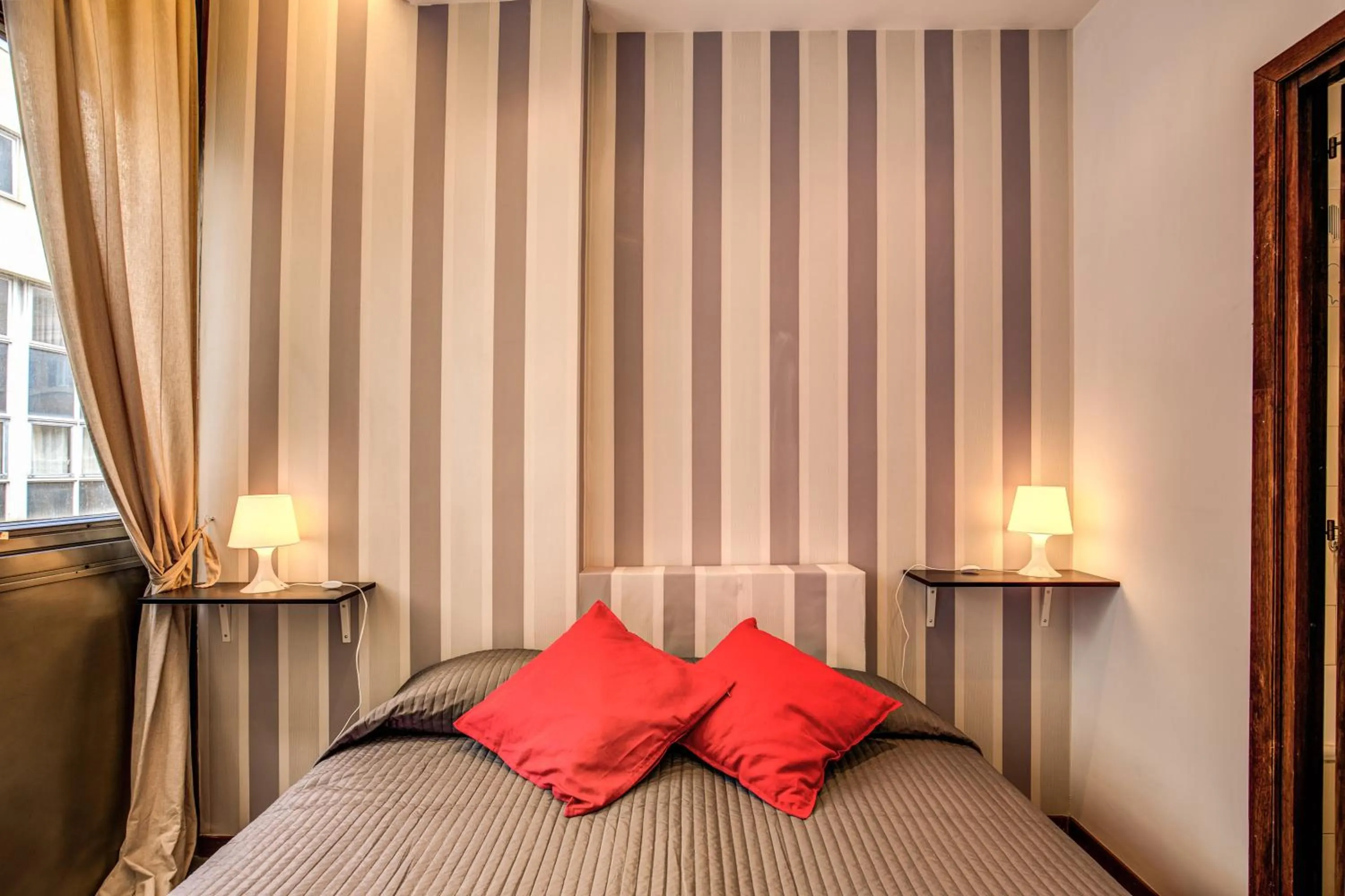 Bed in M&L Apartments - Ardesia Colosseo