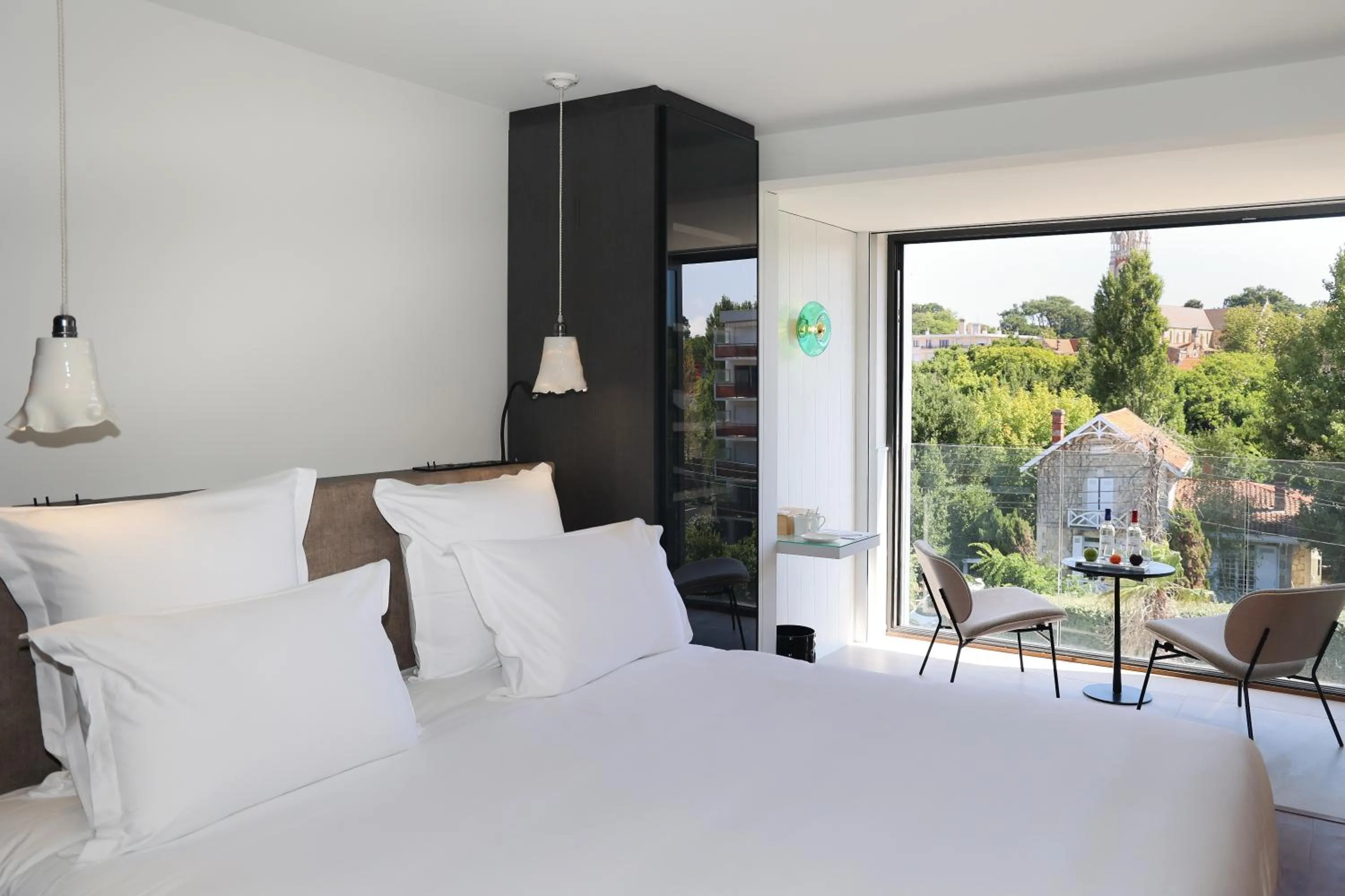 Bed in Les Vagues Hotel & Spa