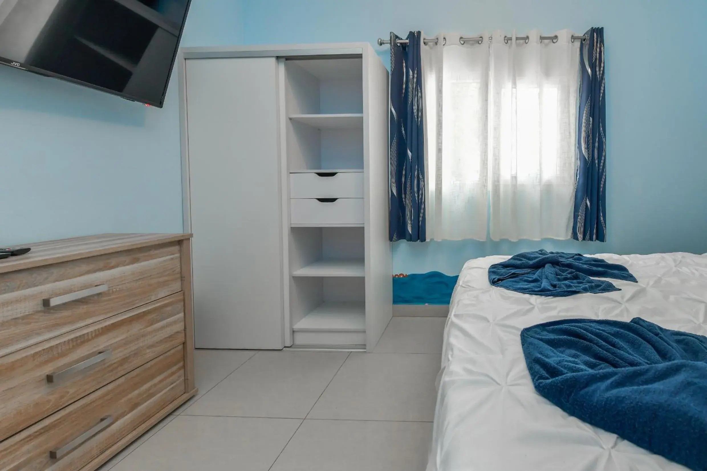 Bed in Boutique Hotel Swiss Paradise Aruba Villas and Suites Bed in Boutique Hotel Swiss Paradise Aruba Villas and Suites