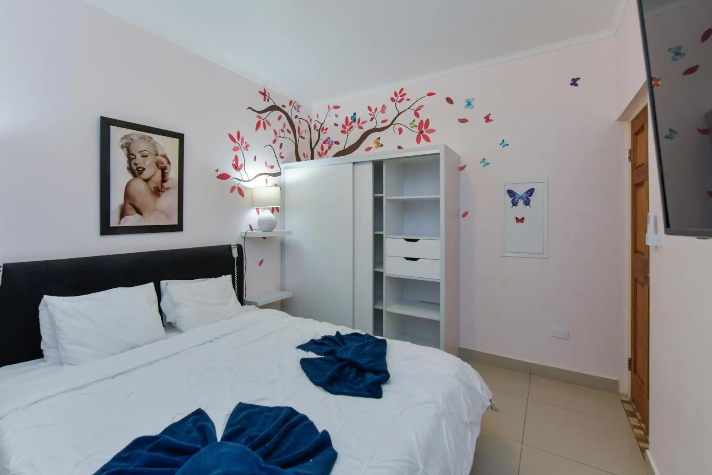 Bed in Boutique Hotel Swiss Paradise Aruba Villas and Suites Bed in Boutique Hotel Swiss Paradise Aruba Villas and Suites