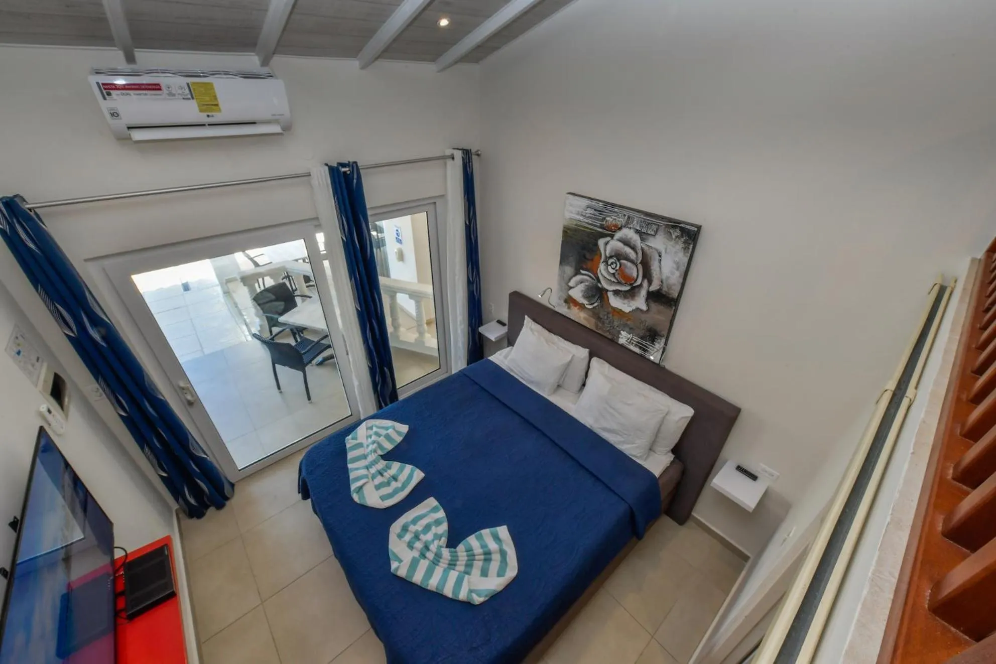 Bed in Boutique Hotel Swiss Paradise Aruba Villas and Suites