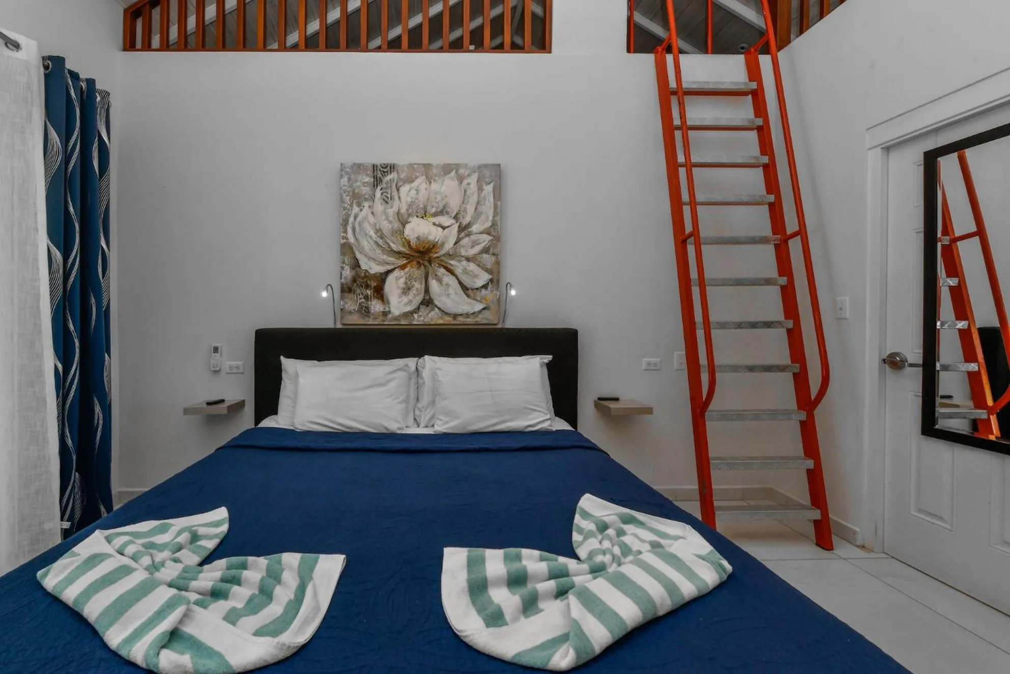 Bed in Boutique Hotel Swiss Paradise Aruba Villas and Suites