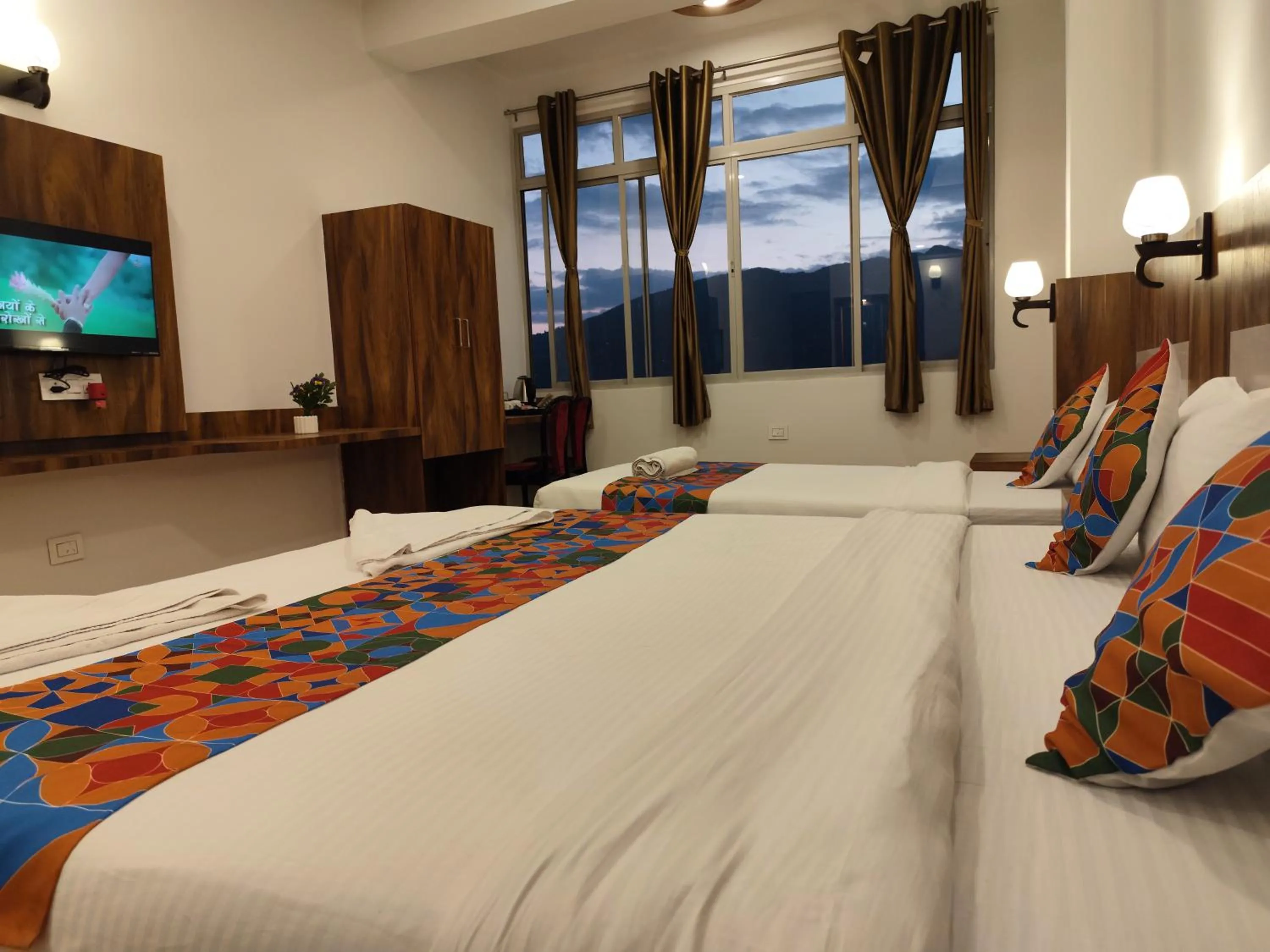 Communal lounge/ TV room, Bed in HOTEL GREENERY VIEW