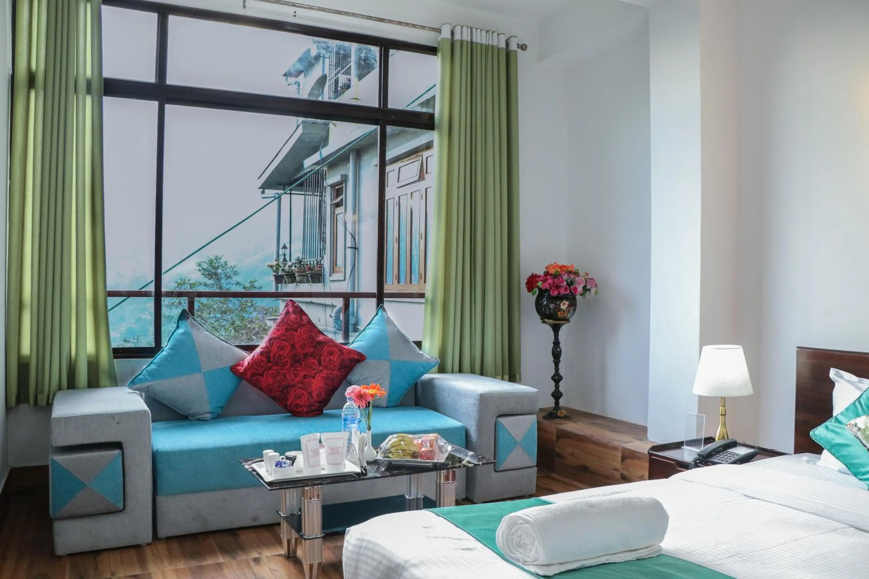 Bed in HOTEL GREENERY VIEW