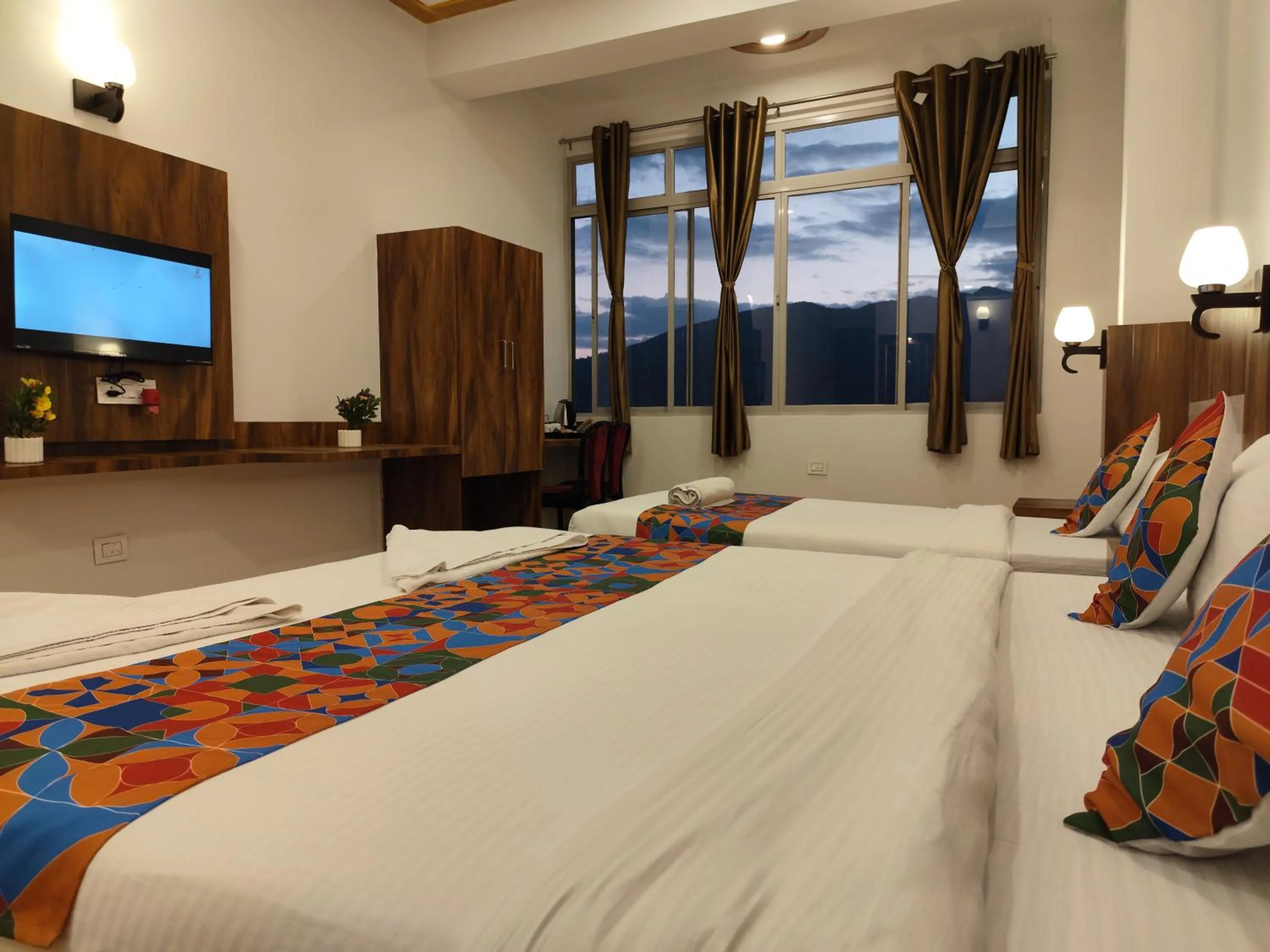 Communal lounge/ TV room, Bed in HOTEL GREENERY VIEW