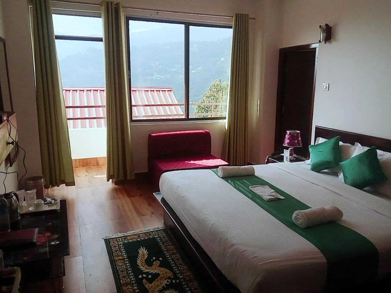 Bed in HOTEL GREENERY VIEW