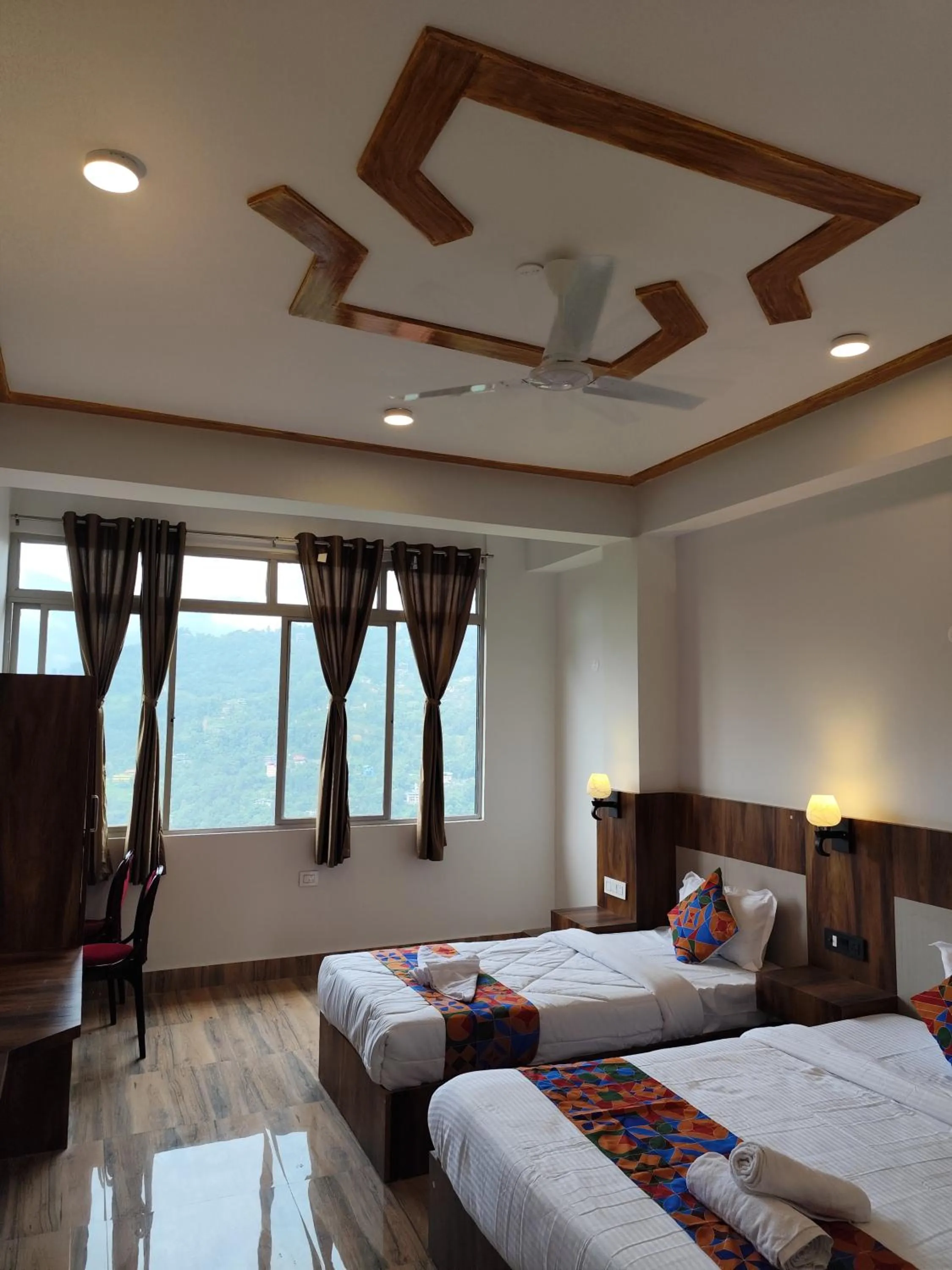 Bed in HOTEL GREENERY VIEW