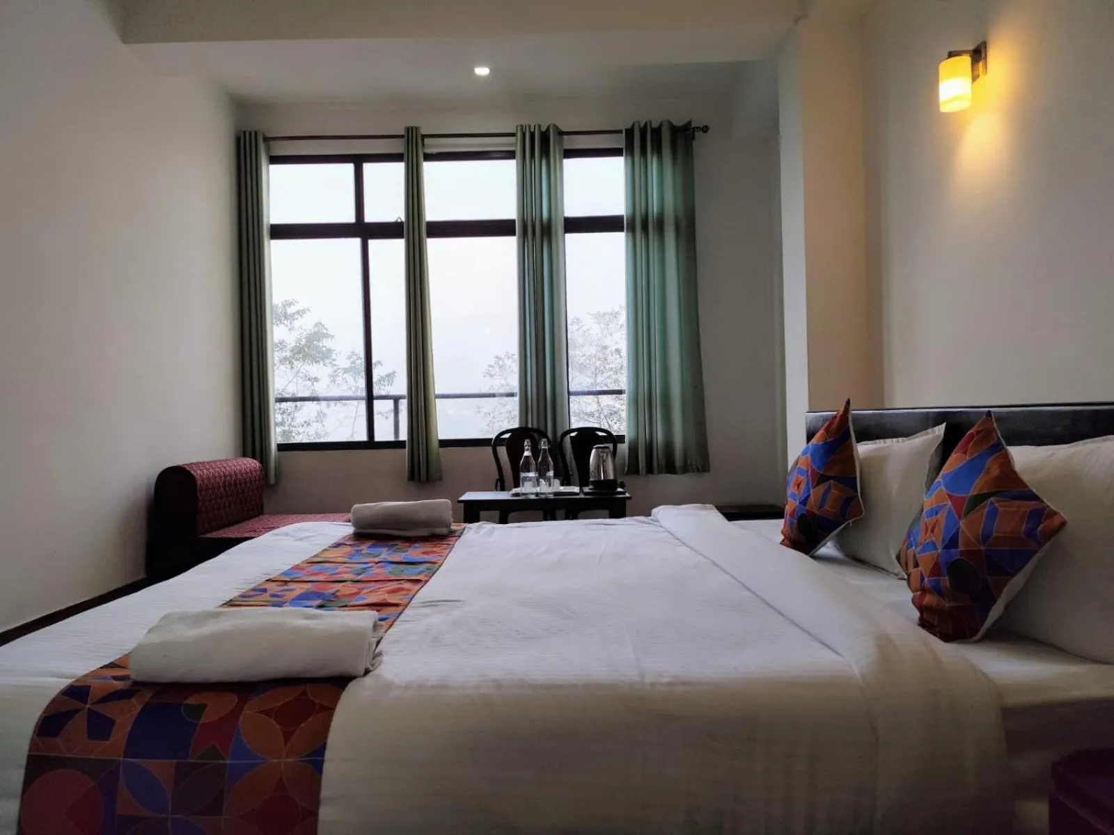 Bed in HOTEL GREENERY VIEW