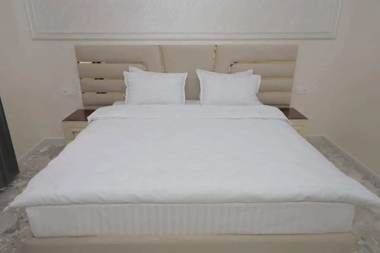 Bed in Ko'k Saroy Plaza Hotel