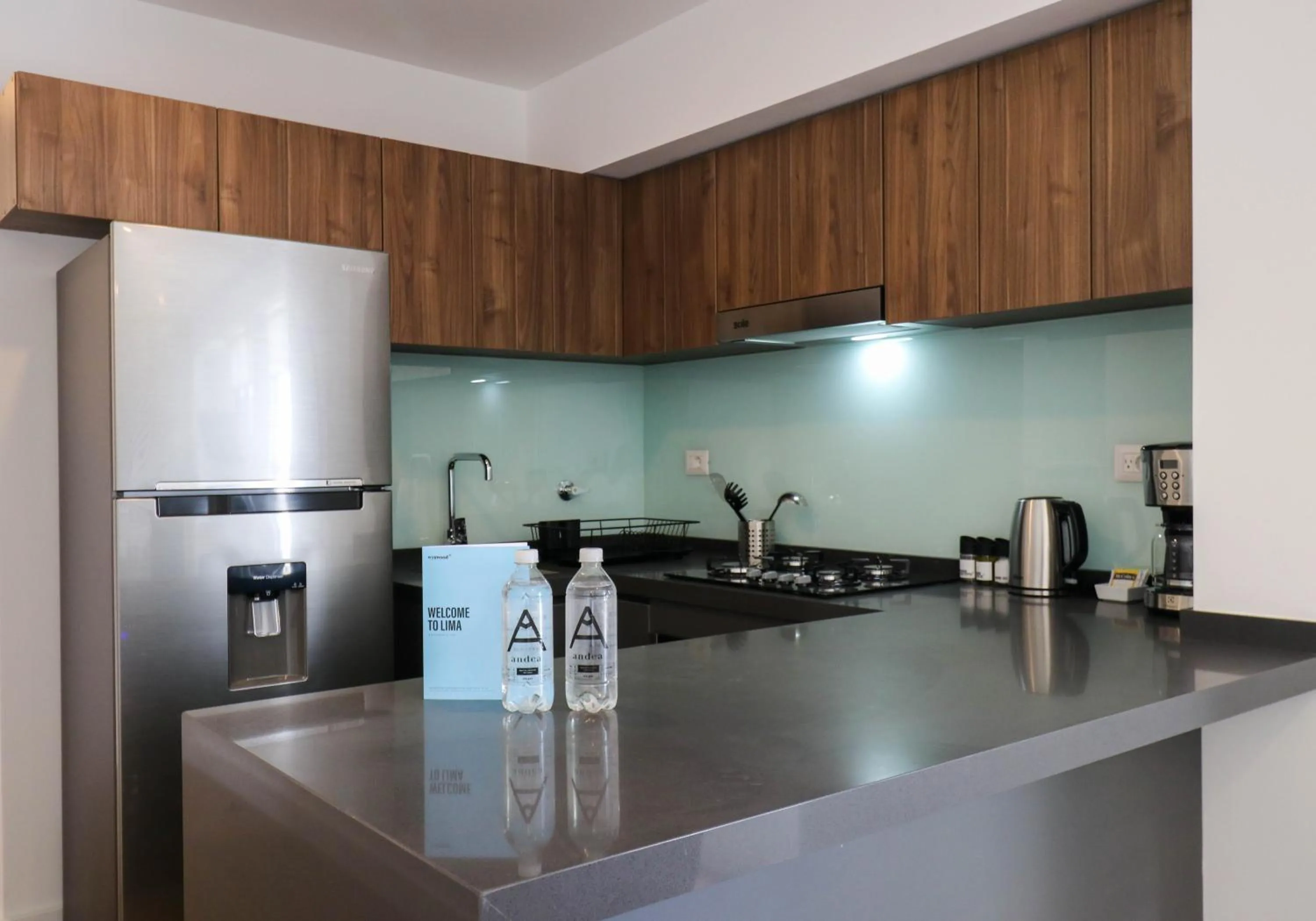 Kitchen or kitchenette in Gray by Wynwood House