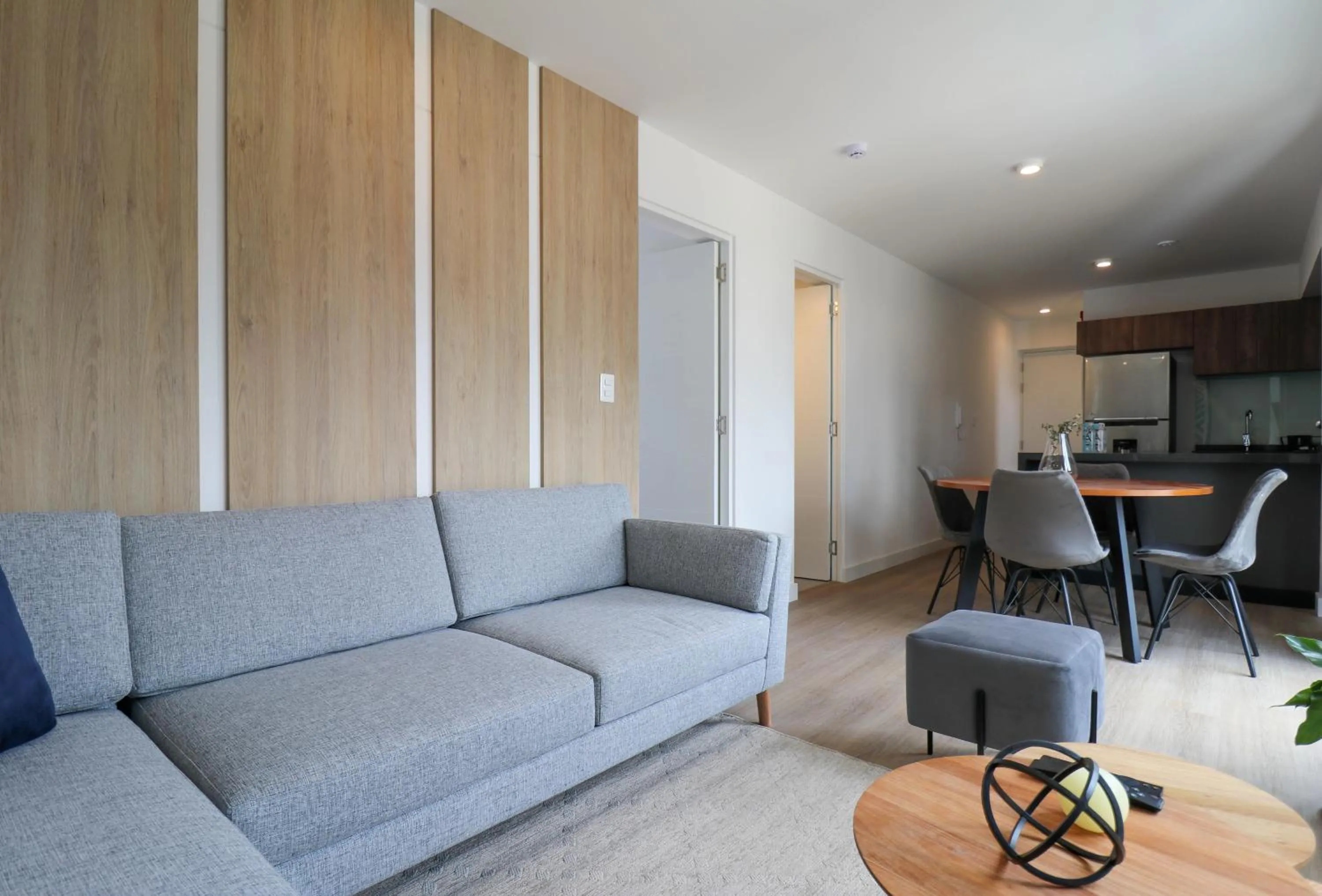 Living room in Gray by Wynwood House