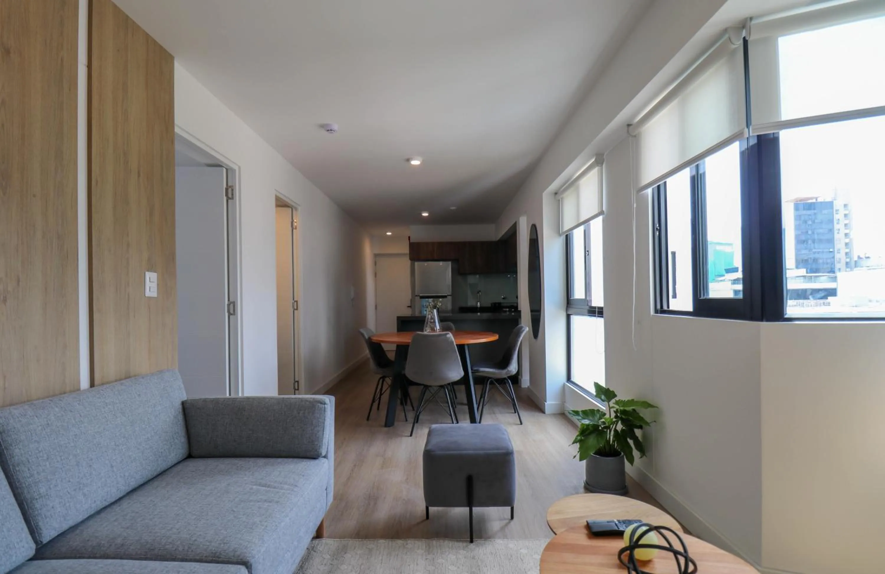 Living room in Gray by Wynwood House