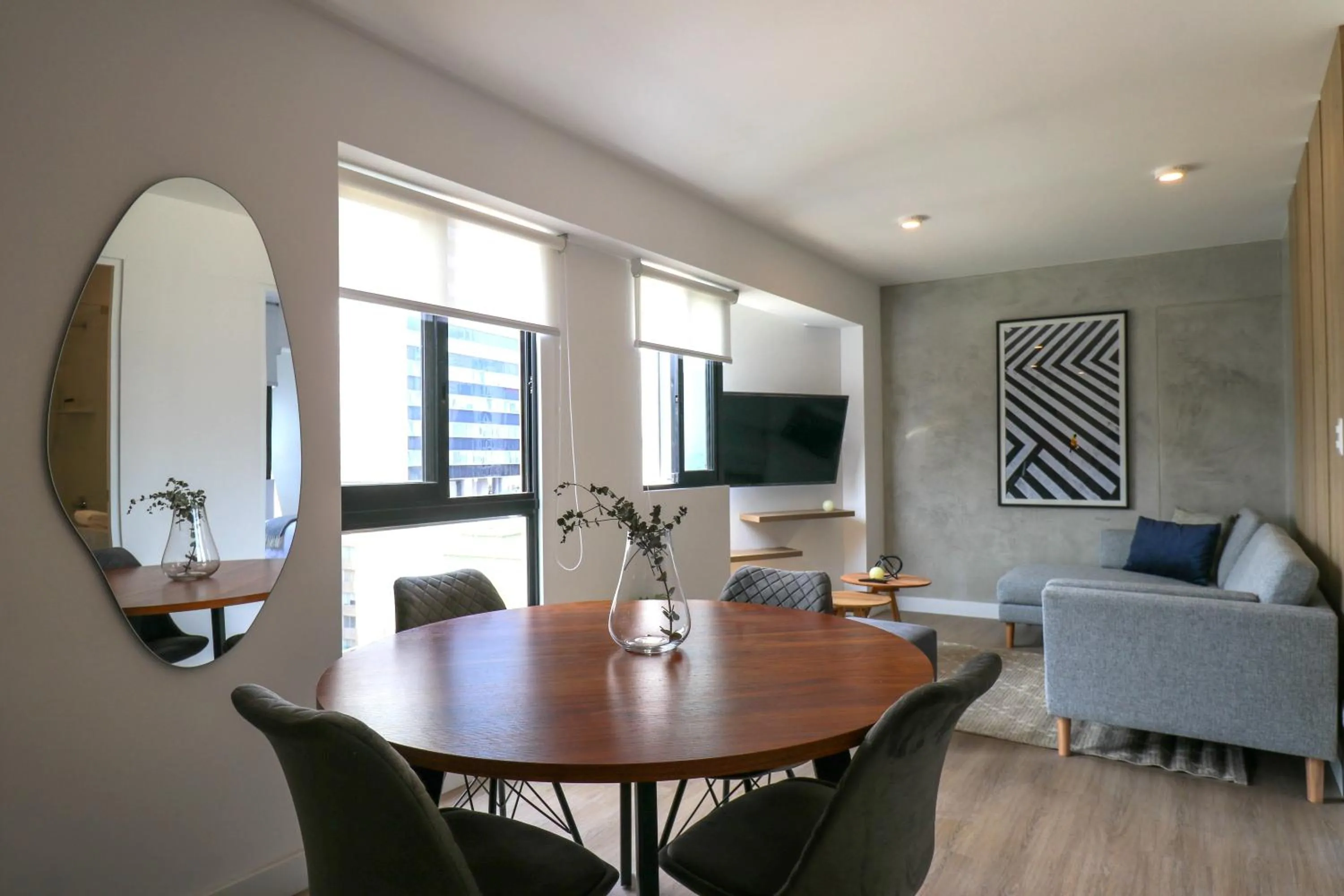 Dining area in Gray by Wynwood House