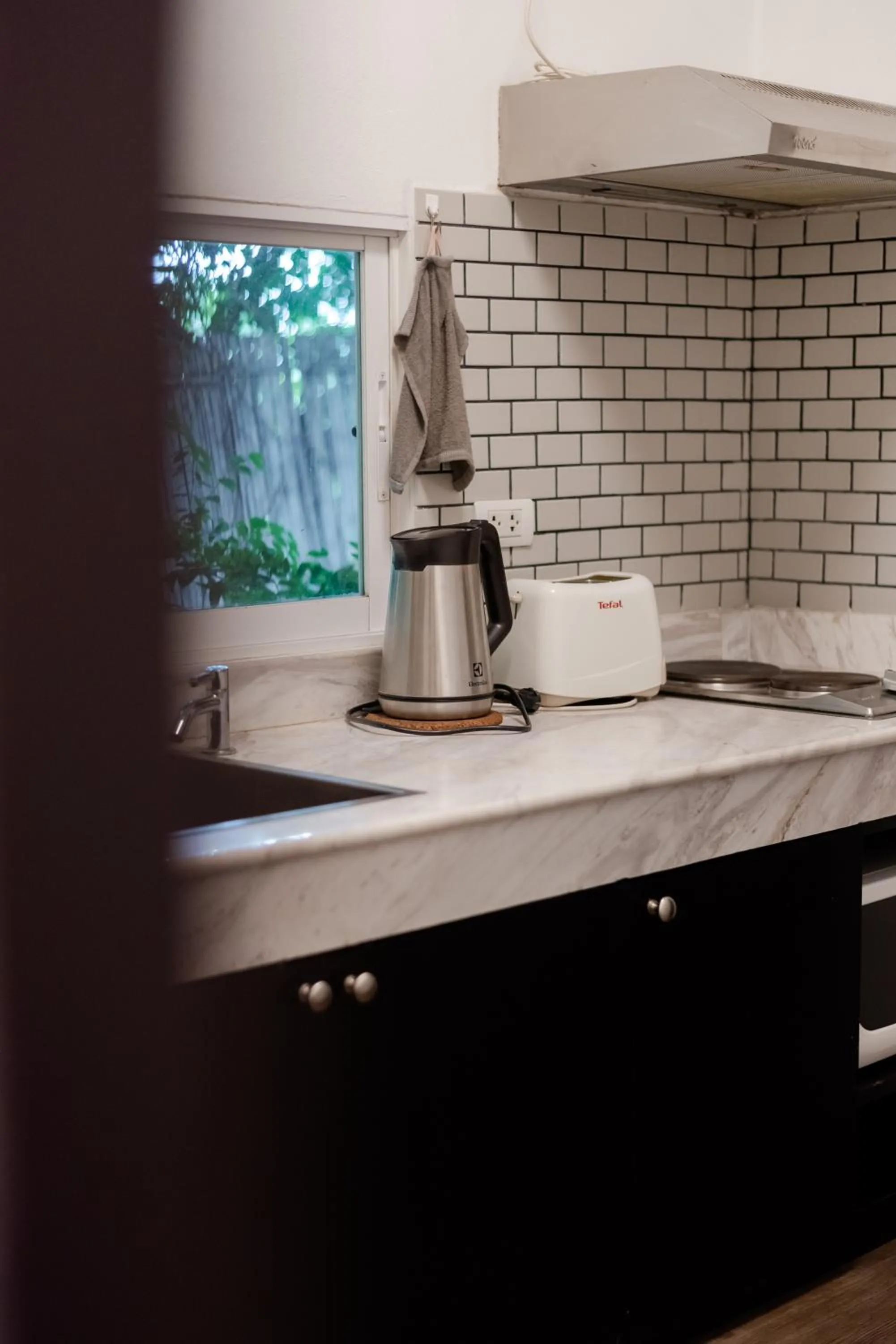 Kitchen or kitchenette in Tolani Southgate Villa Chiang Mai