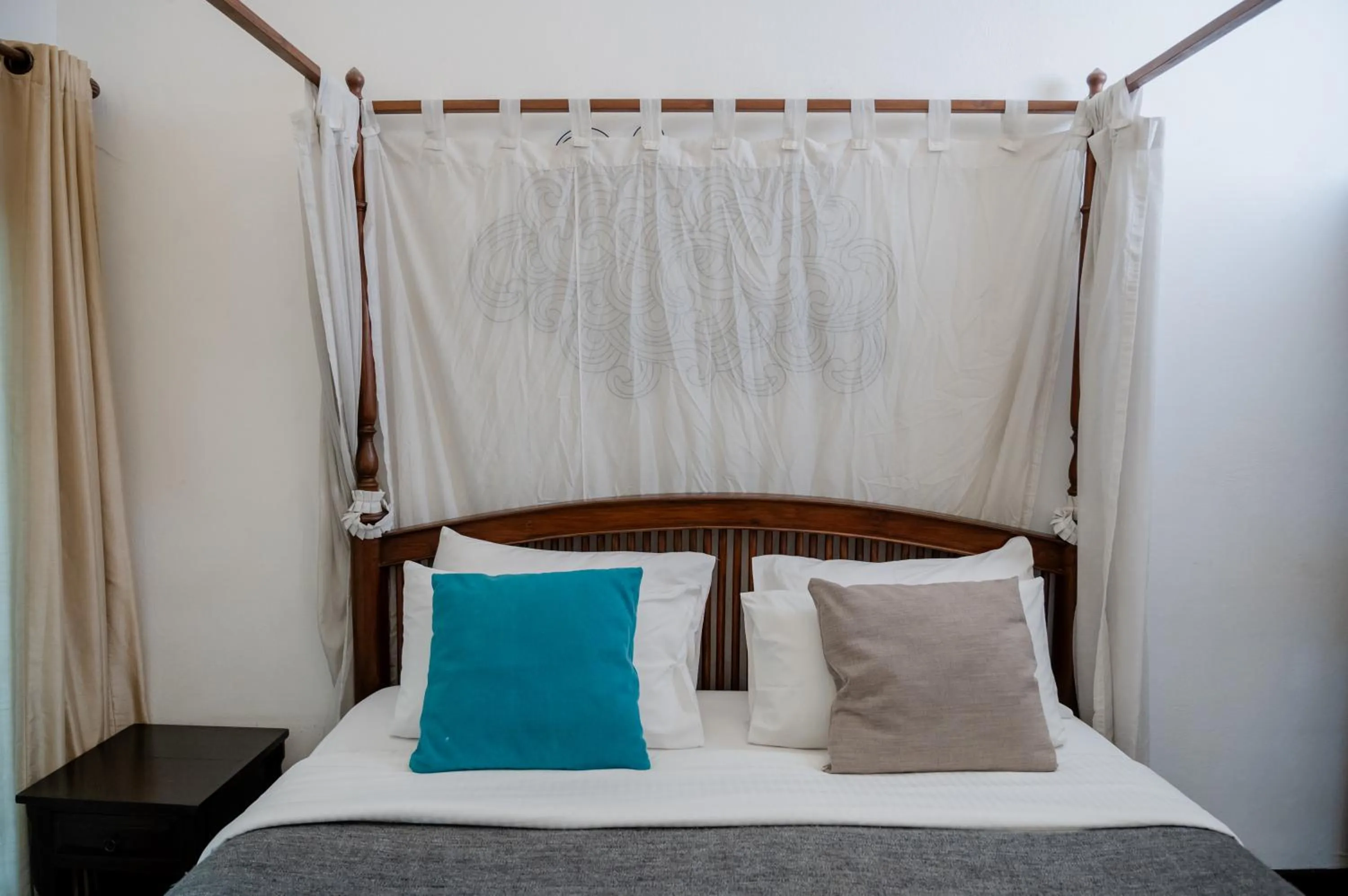 Bed in Tolani Southgate Villa Chiang Mai