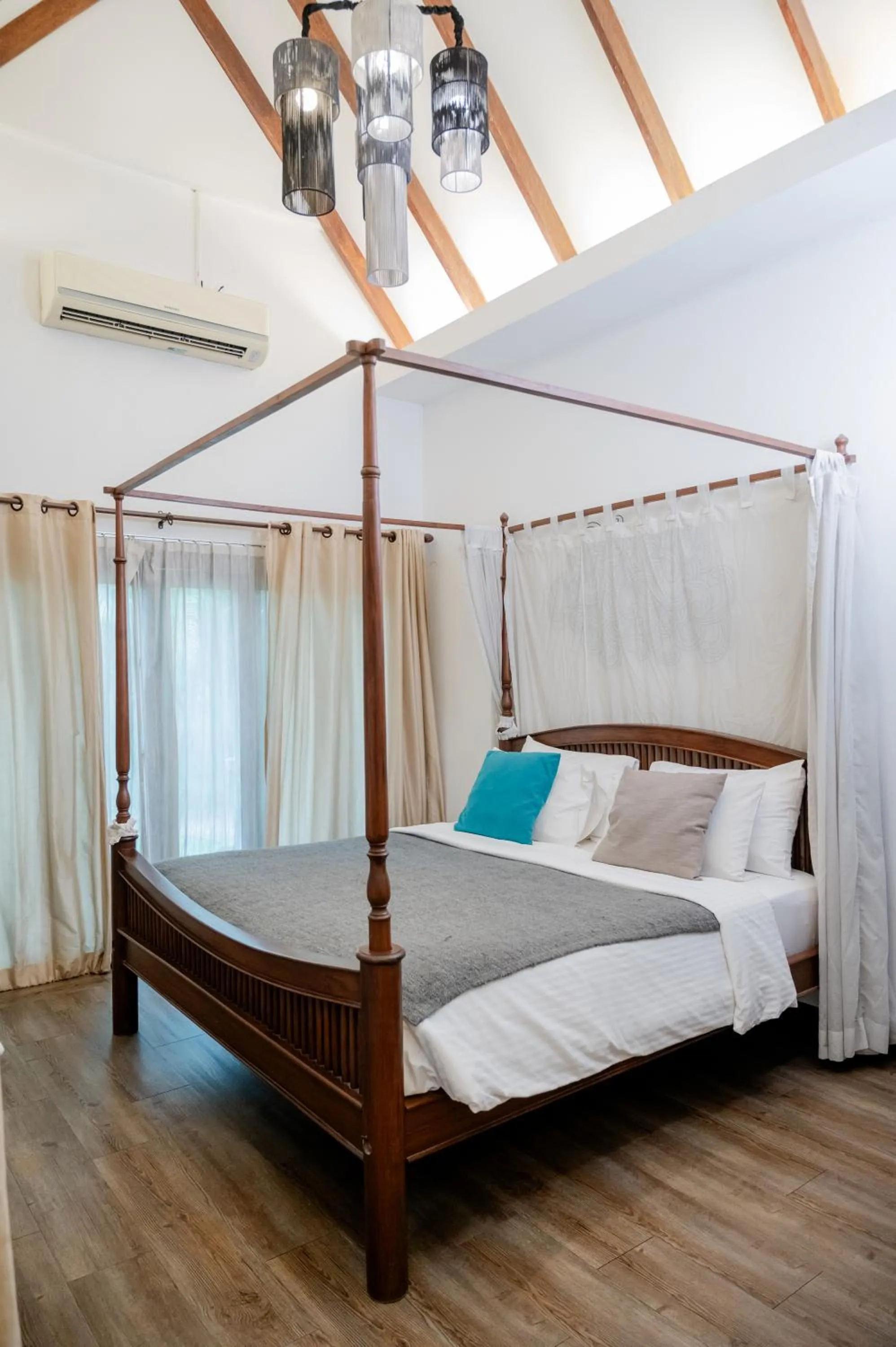 Bed in Tolani Southgate Villa Chiang Mai