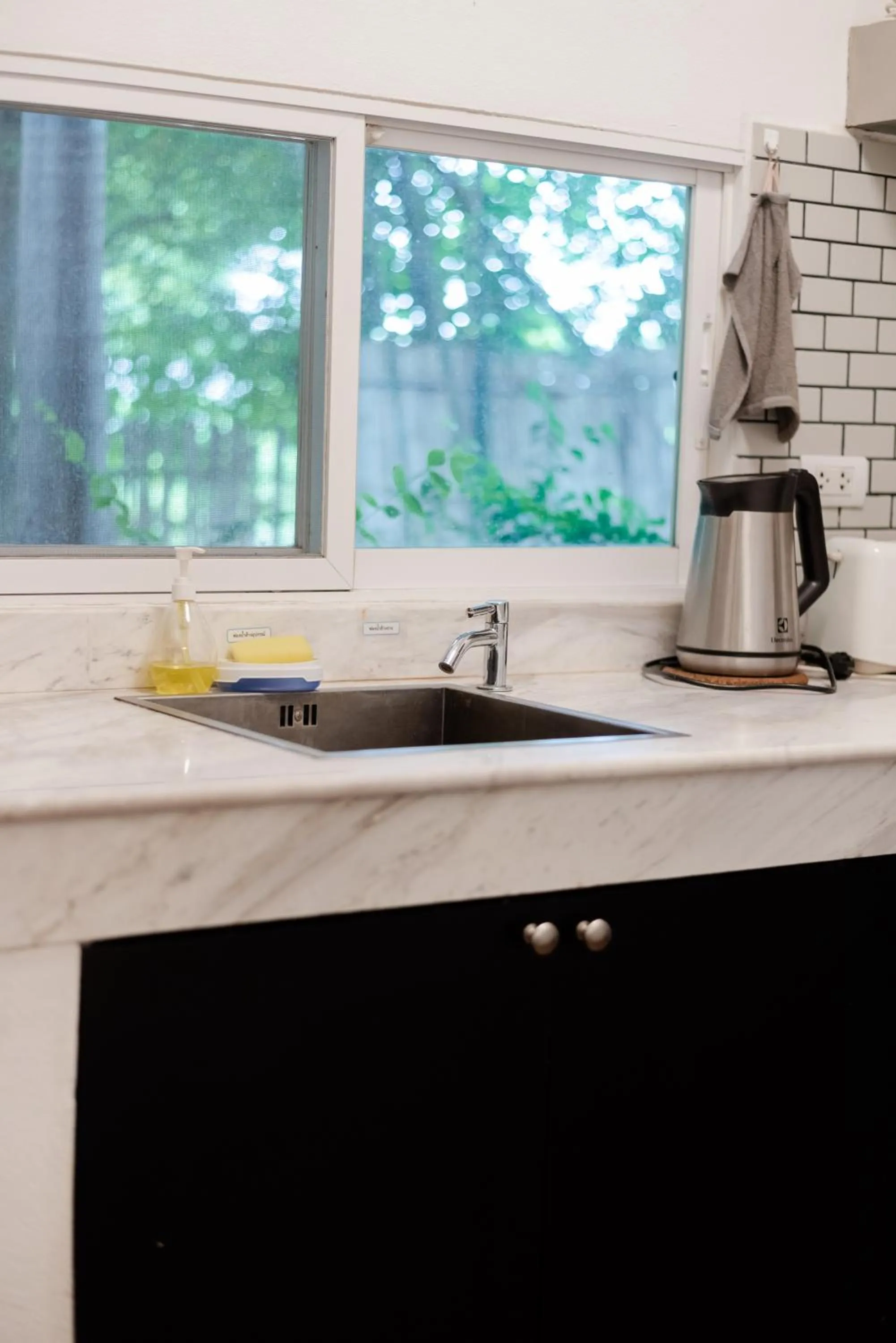 Kitchen or kitchenette in Tolani Southgate Villa Chiang Mai