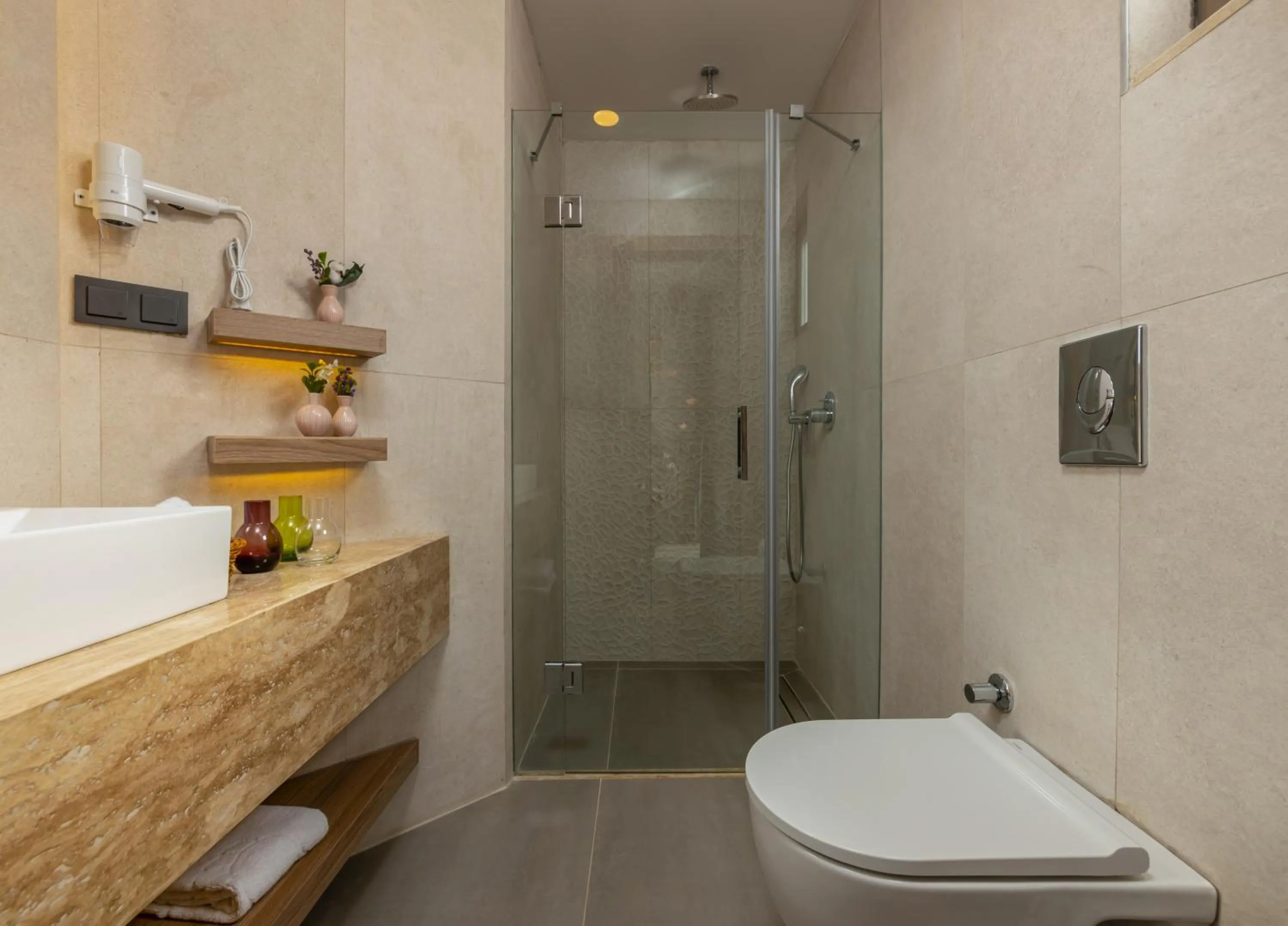 Shower in Ema Houses