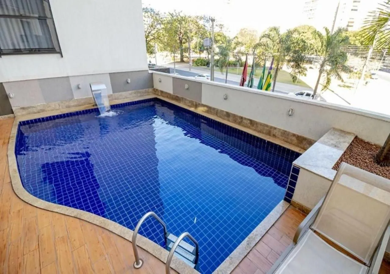 Swimming pool in Sun Square Suítes Hotel By Lual