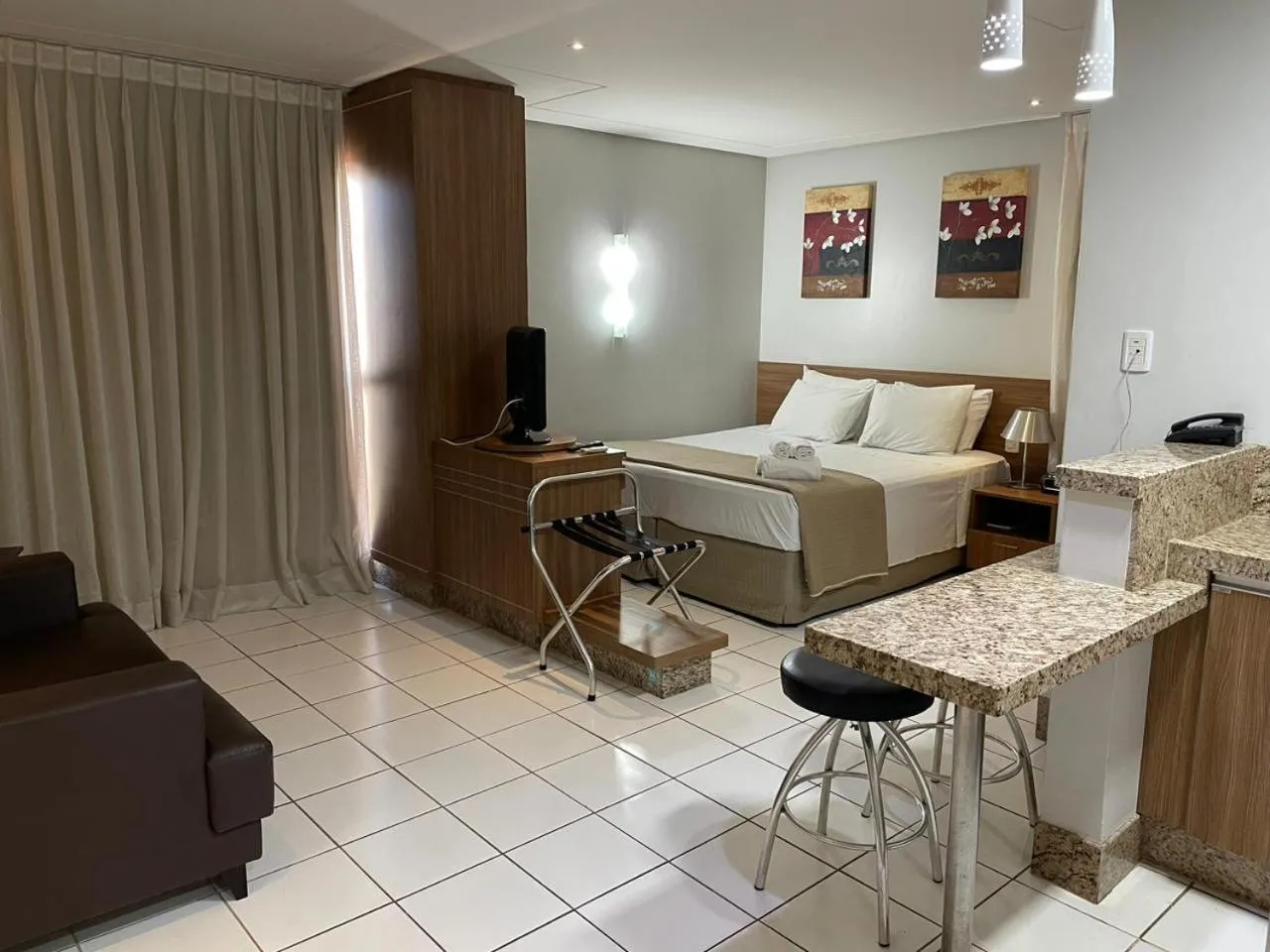 Photo of the whole room in Sun Square Suítes Hotel By Lual