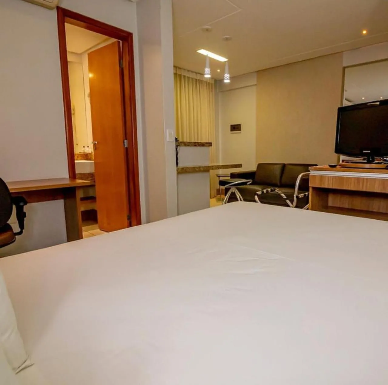 Bed in Sun Square Suítes Hotel By Lual