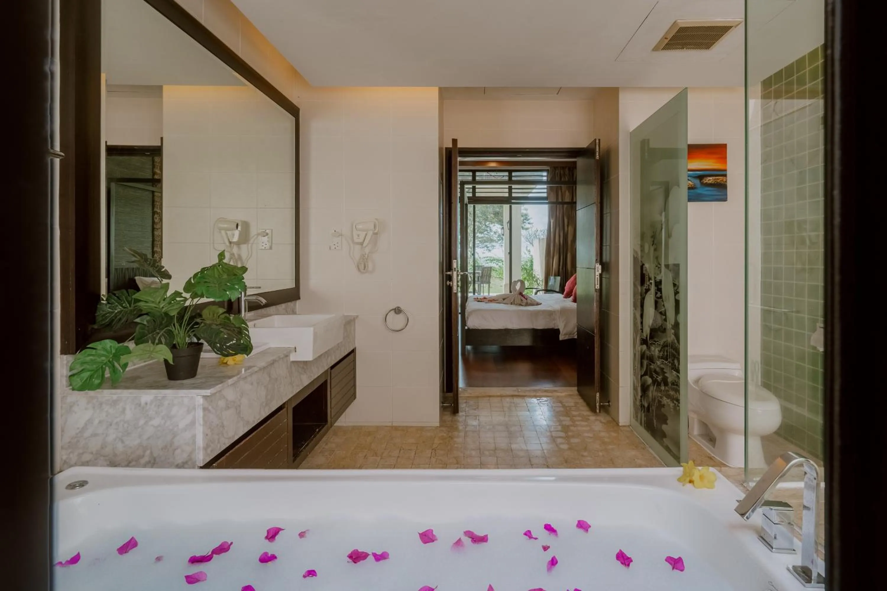 Bathroom, Bed in Borneo Beach Villa & Suite