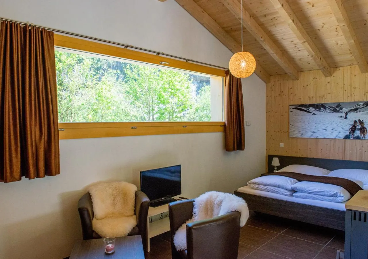 Bed in Hüttenhotel Husky Lodge