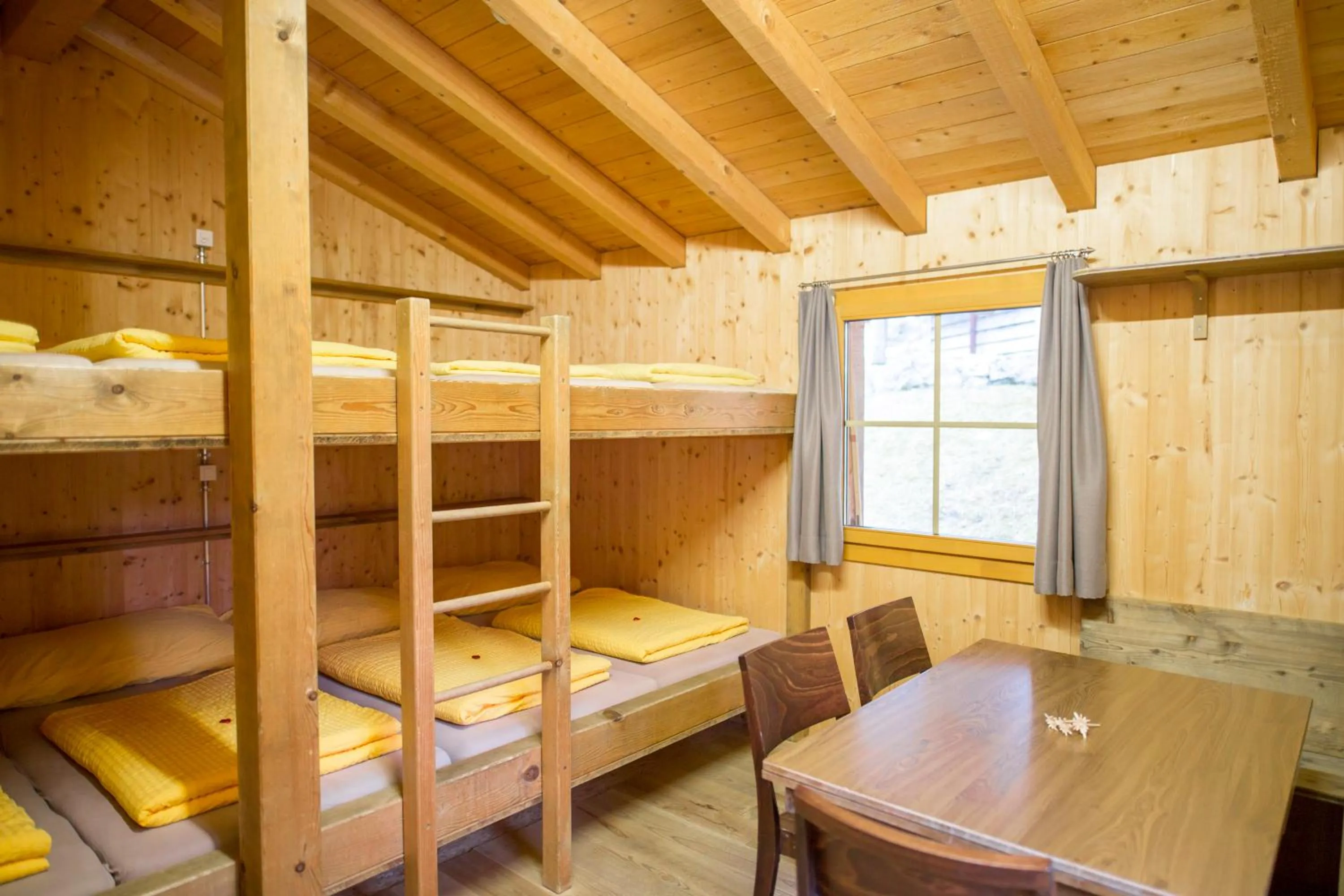 Bed in Hüttenhotel Husky Lodge