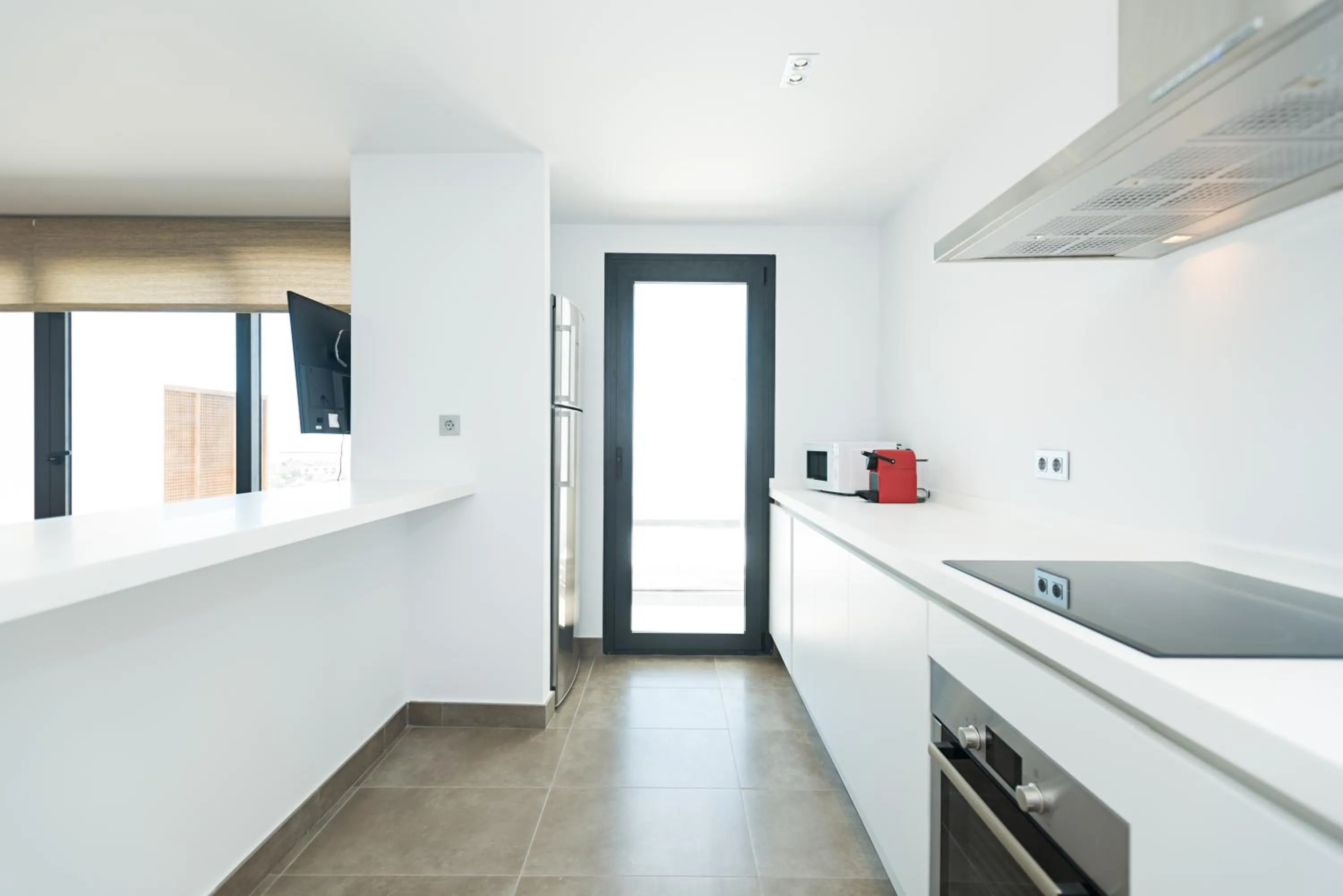 Kitchen or kitchenette in Altos de la Gloria Beach Apartments