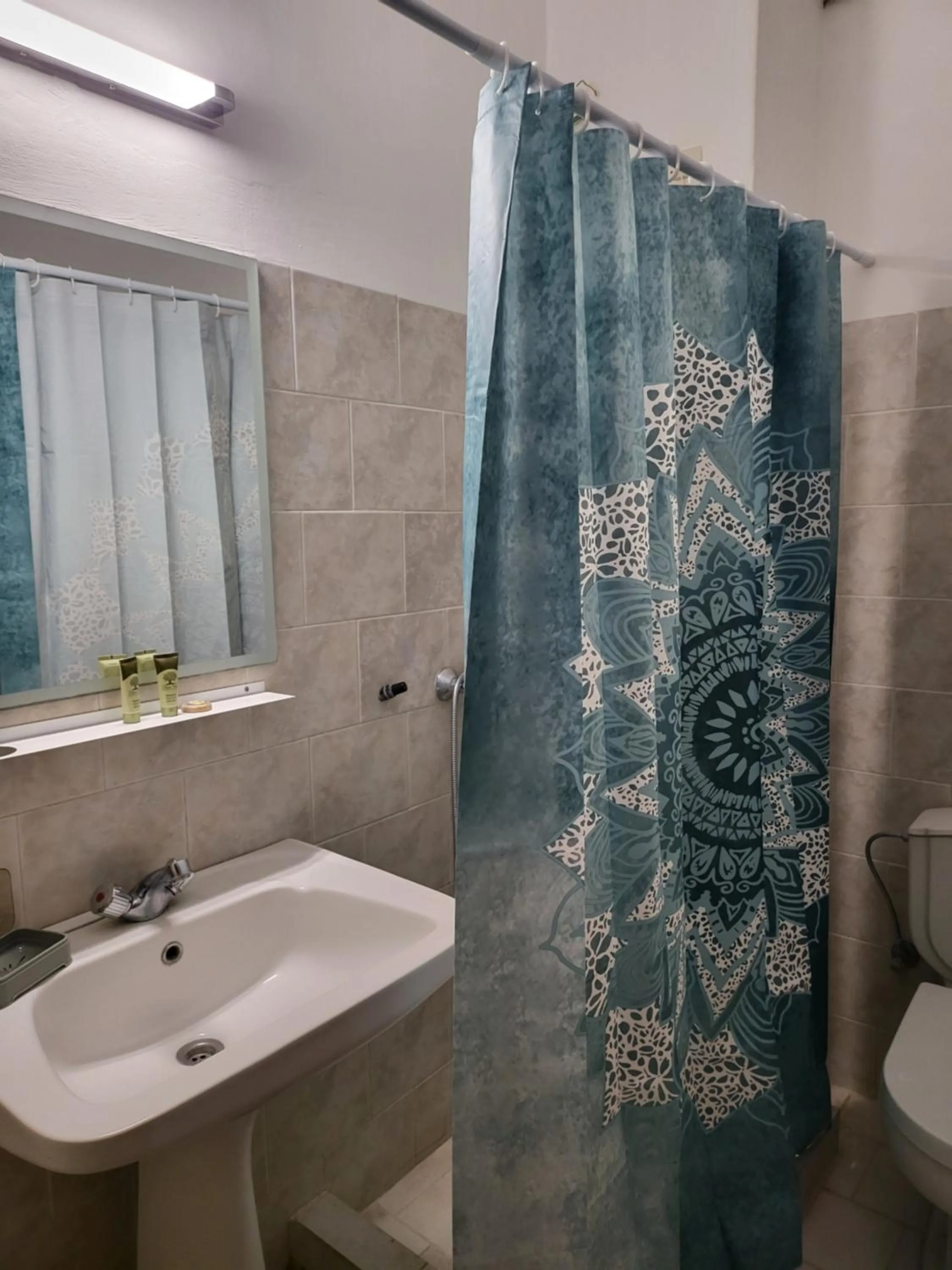 Shower in Pyrgos Hotel Apartments