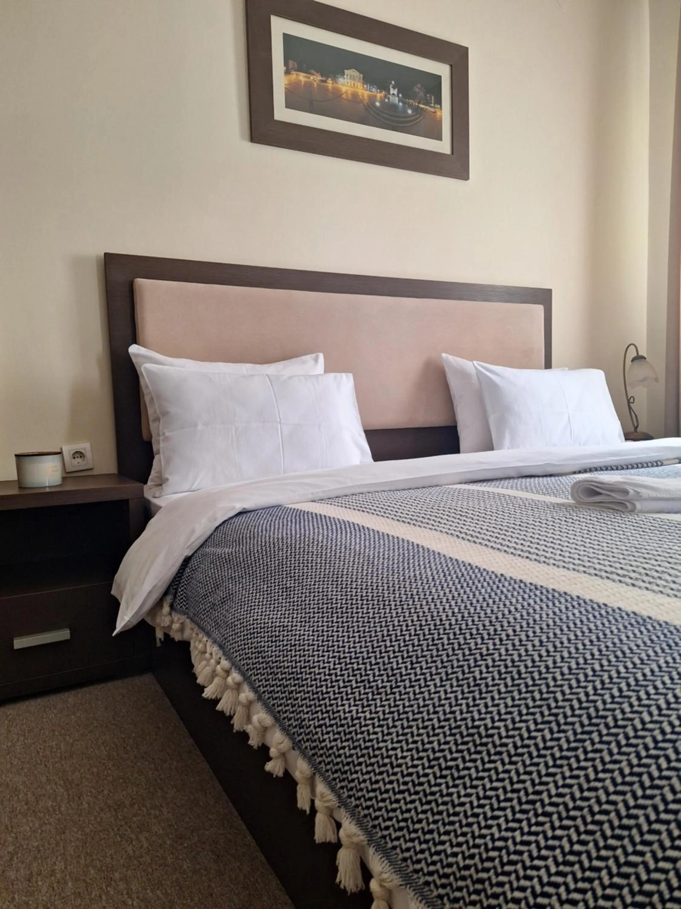 Bed in Garni Hotel Ema