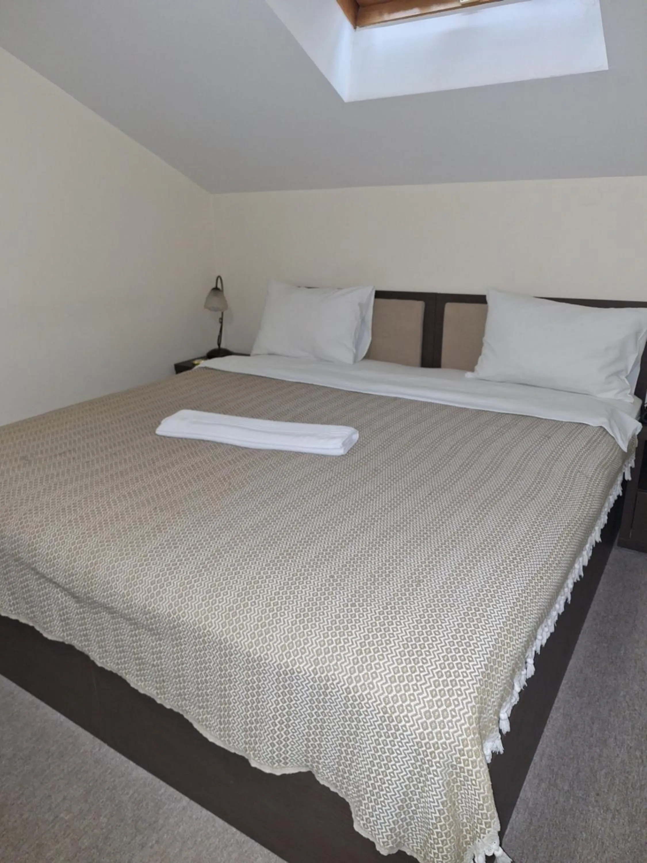 Bed in Garni Hotel Ema