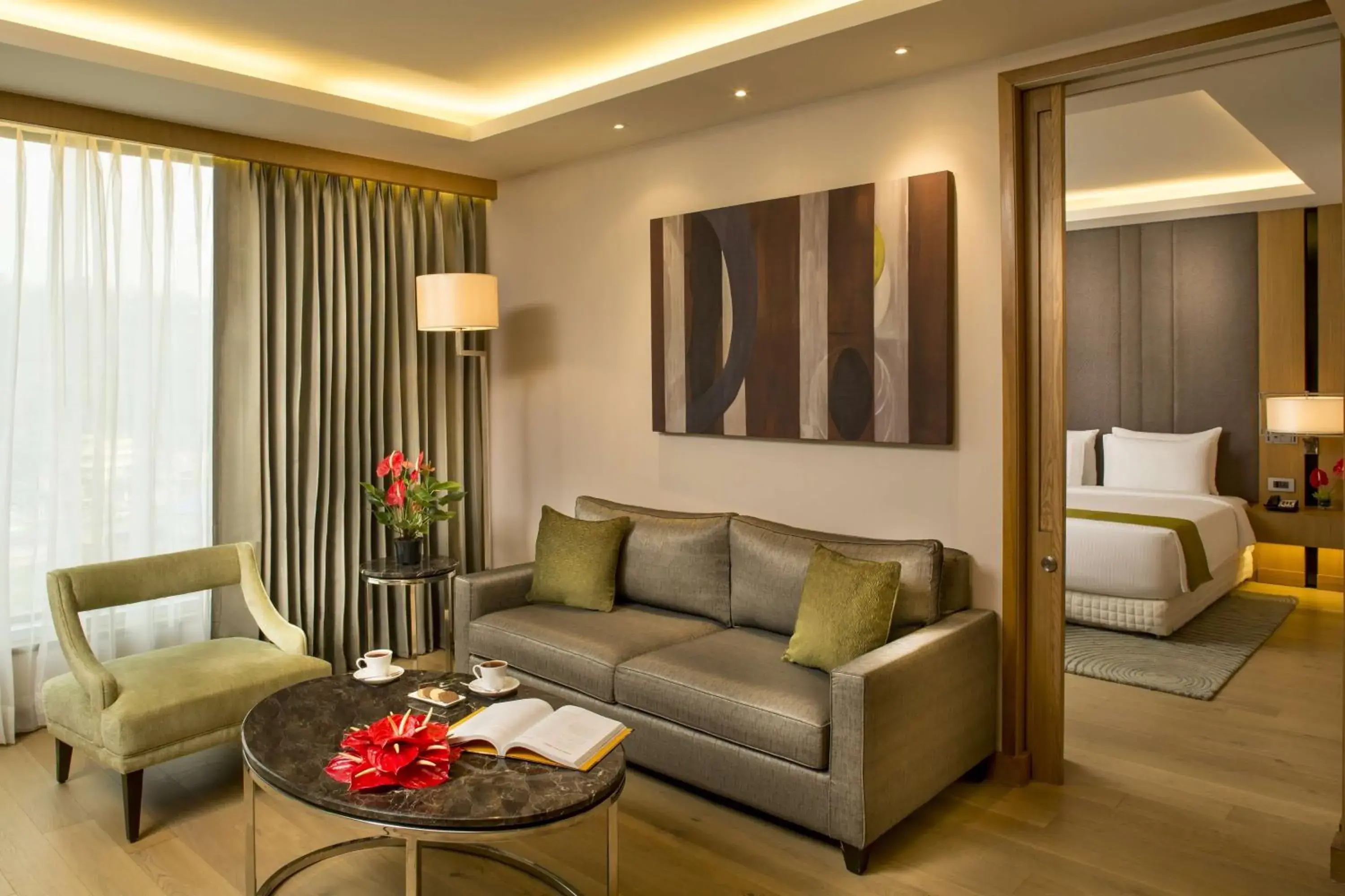 Suite Bedroom with separate living room & bed room with King bed, Bath tub , free Wi-fi , 2 way airport transfer, bottle of complimentary House wine in Radisson Blu Hotel Guwahati Suite Bedroom with separate living room & bed room with King bed, Bath tub , free Wi-fi , 2 way airport transfer, bottle of complimentary House wine in Radisson Blu Hotel Guwahati