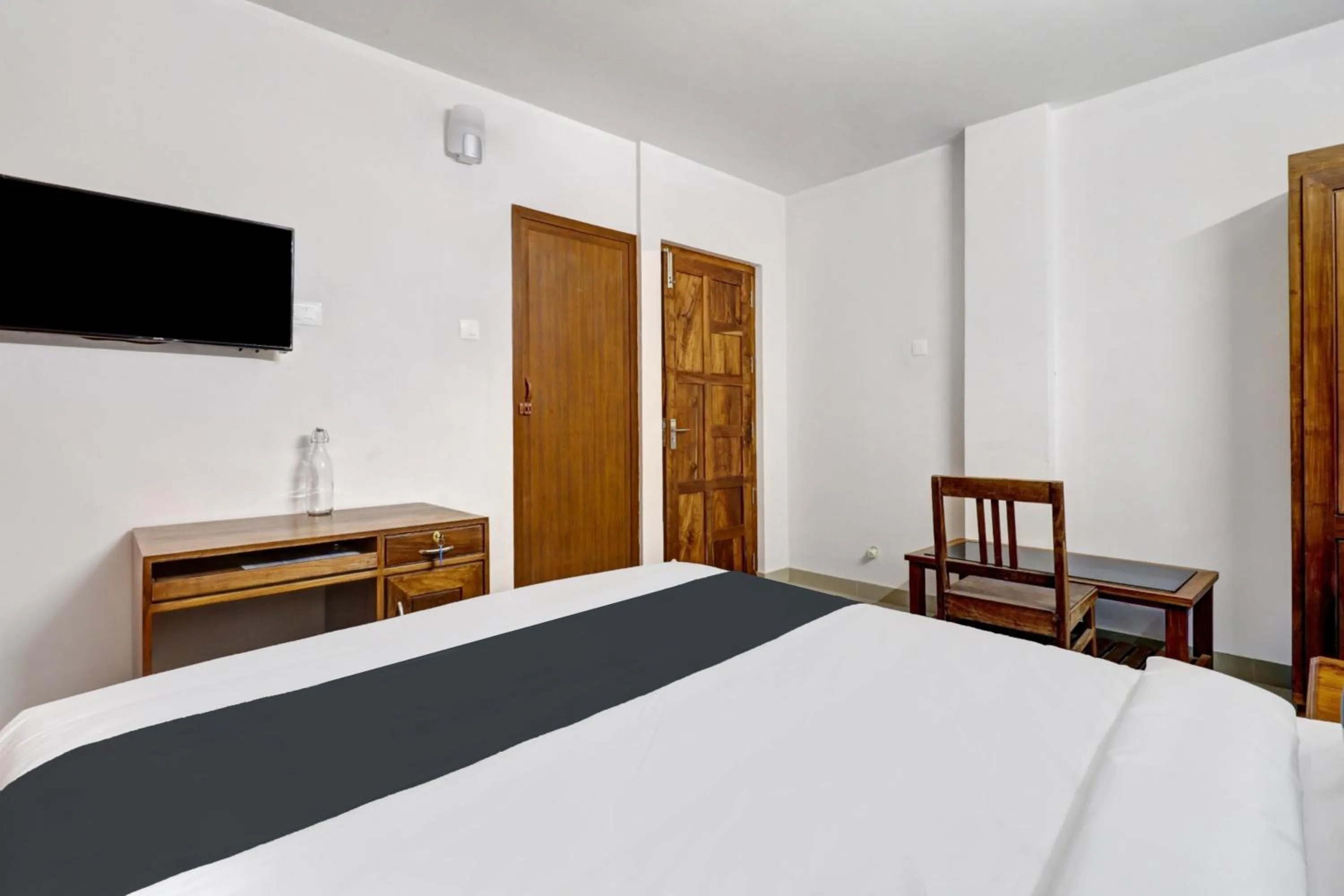 Bedroom, Bed in Super Hotel O Anayara Near Lulu Mall formerly Timber Residency