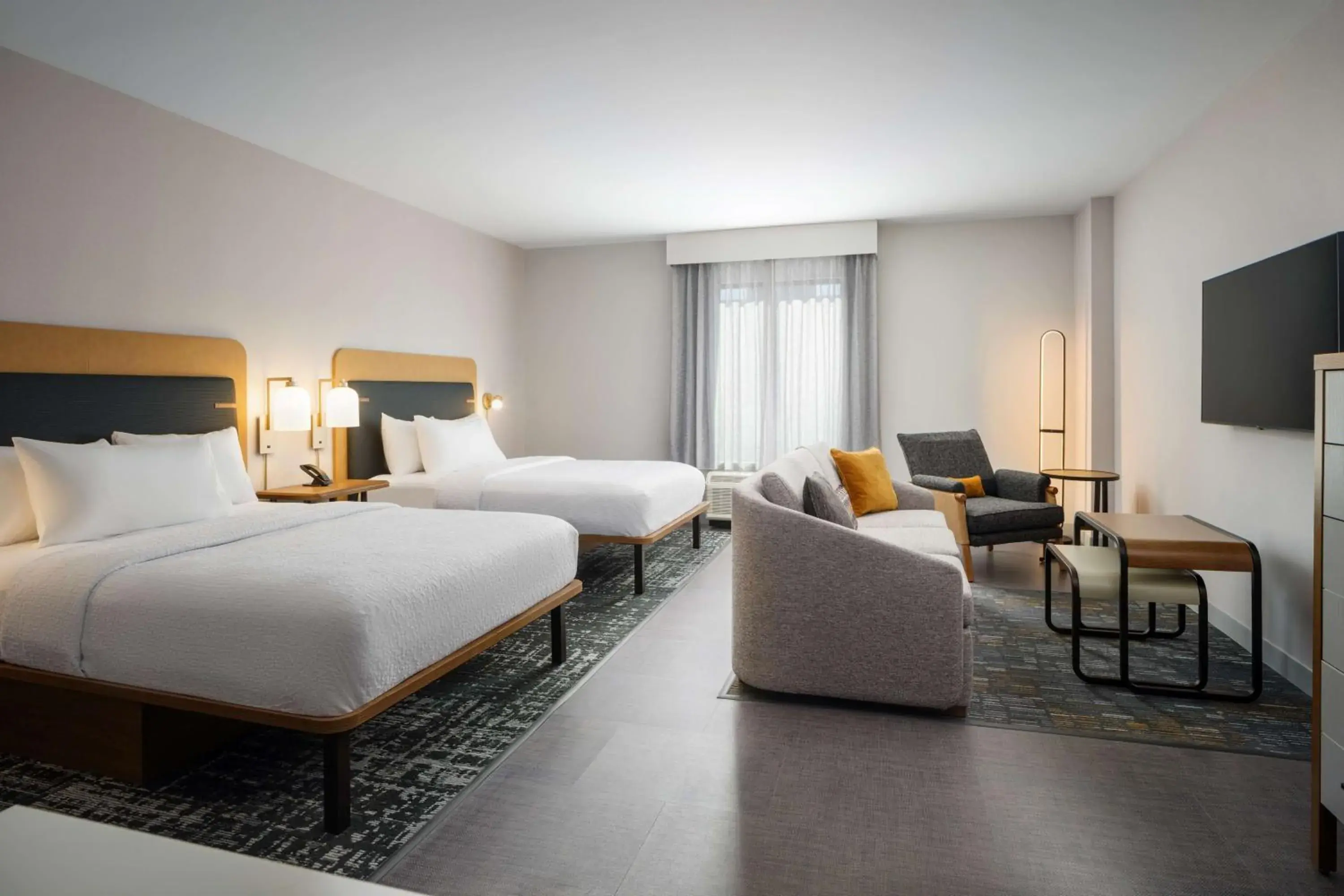 Living room, Bed in Homewood Suites By Hilton Raleigh Downtown Living room, Bed in Homewood Suites By Hilton Raleigh Downtown