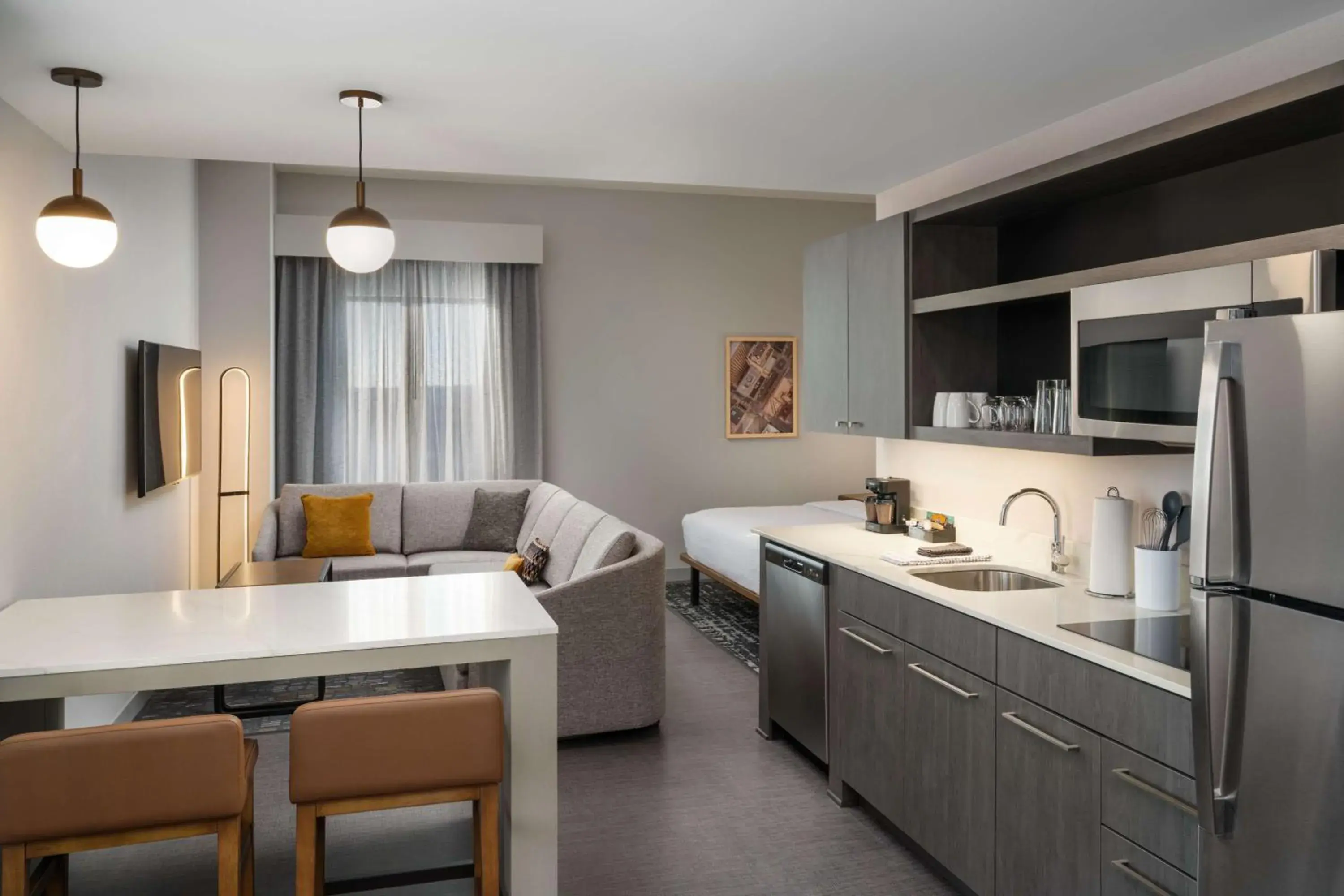 Living room in Homewood Suites By Hilton Raleigh Downtown Living room in Homewood Suites By Hilton Raleigh Downtown