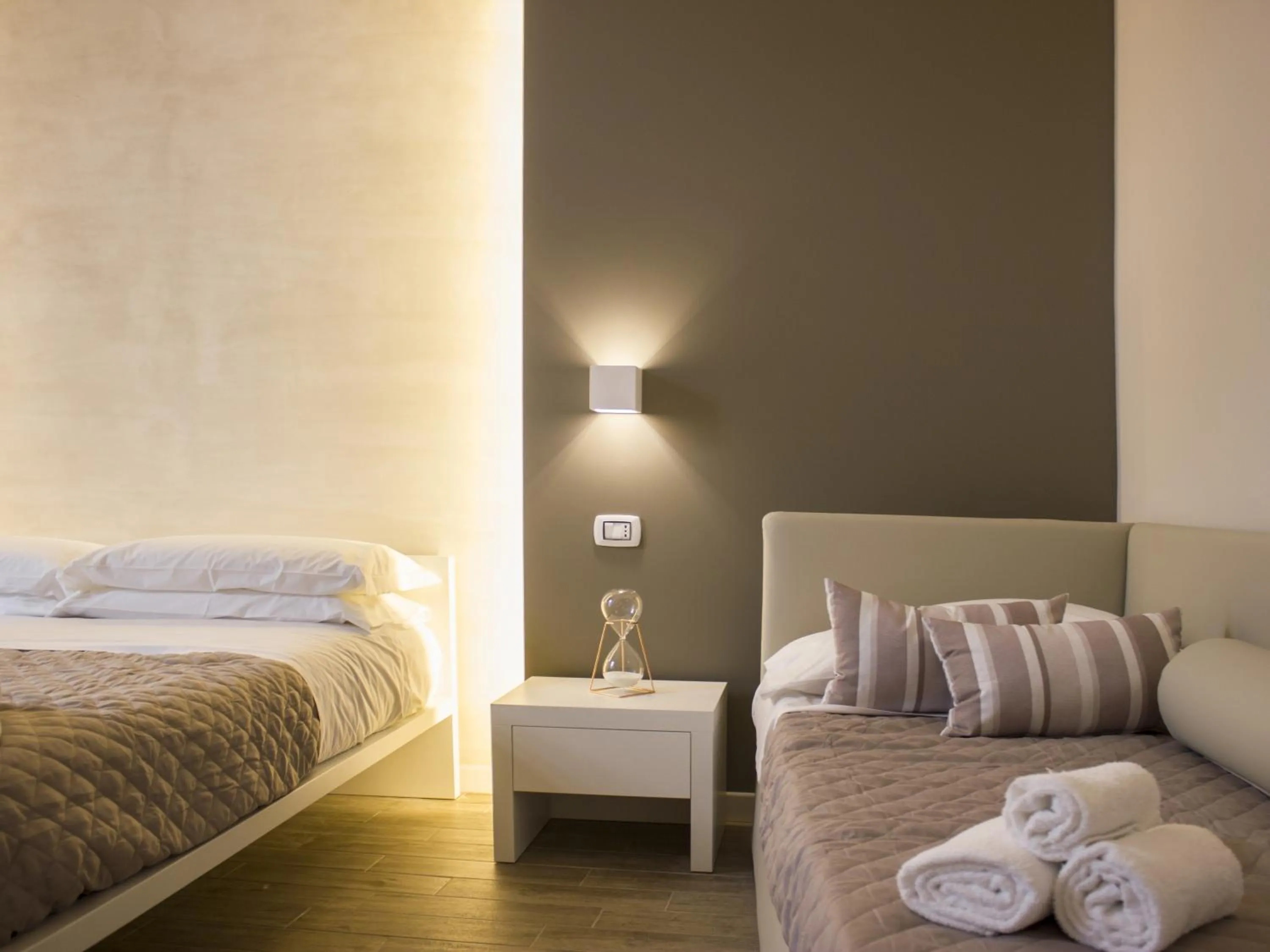 Bed in La Banchina Holiday Rooms