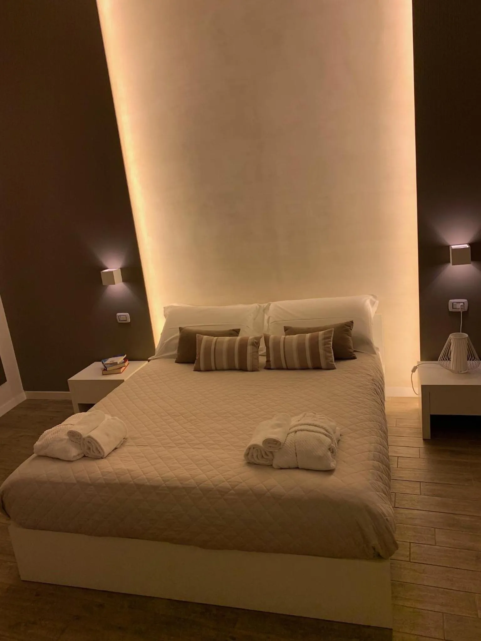 Bed in La Banchina Holiday Rooms