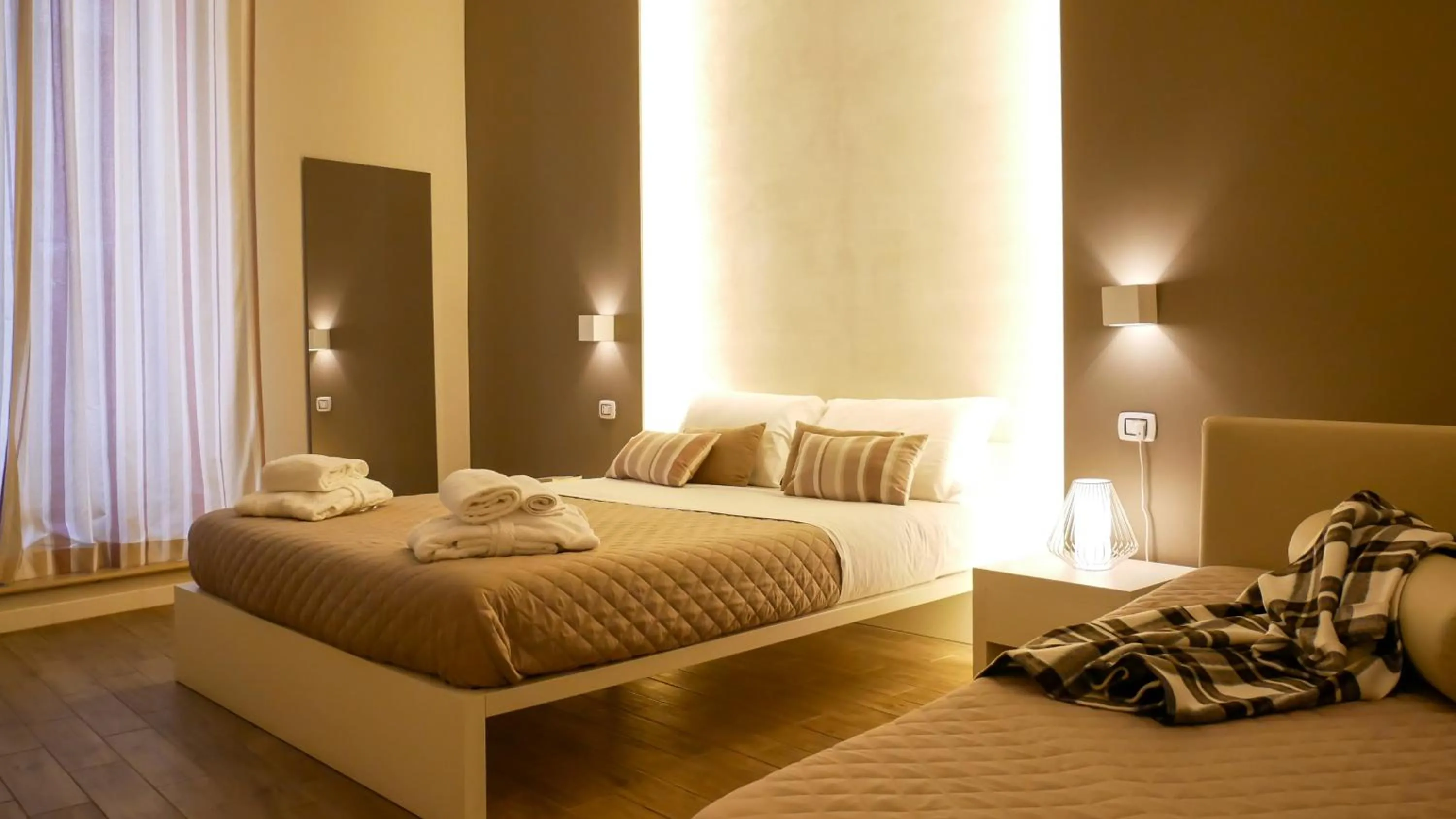 Photo of the whole room, Bed in La Banchina Holiday Rooms