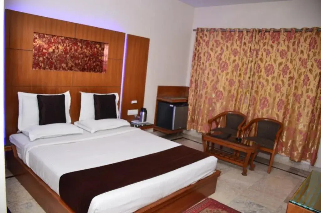 Bed in Hotel Basera Brij Bhoomi Vrindavan Bed in Hotel Basera Brij Bhoomi Vrindavan