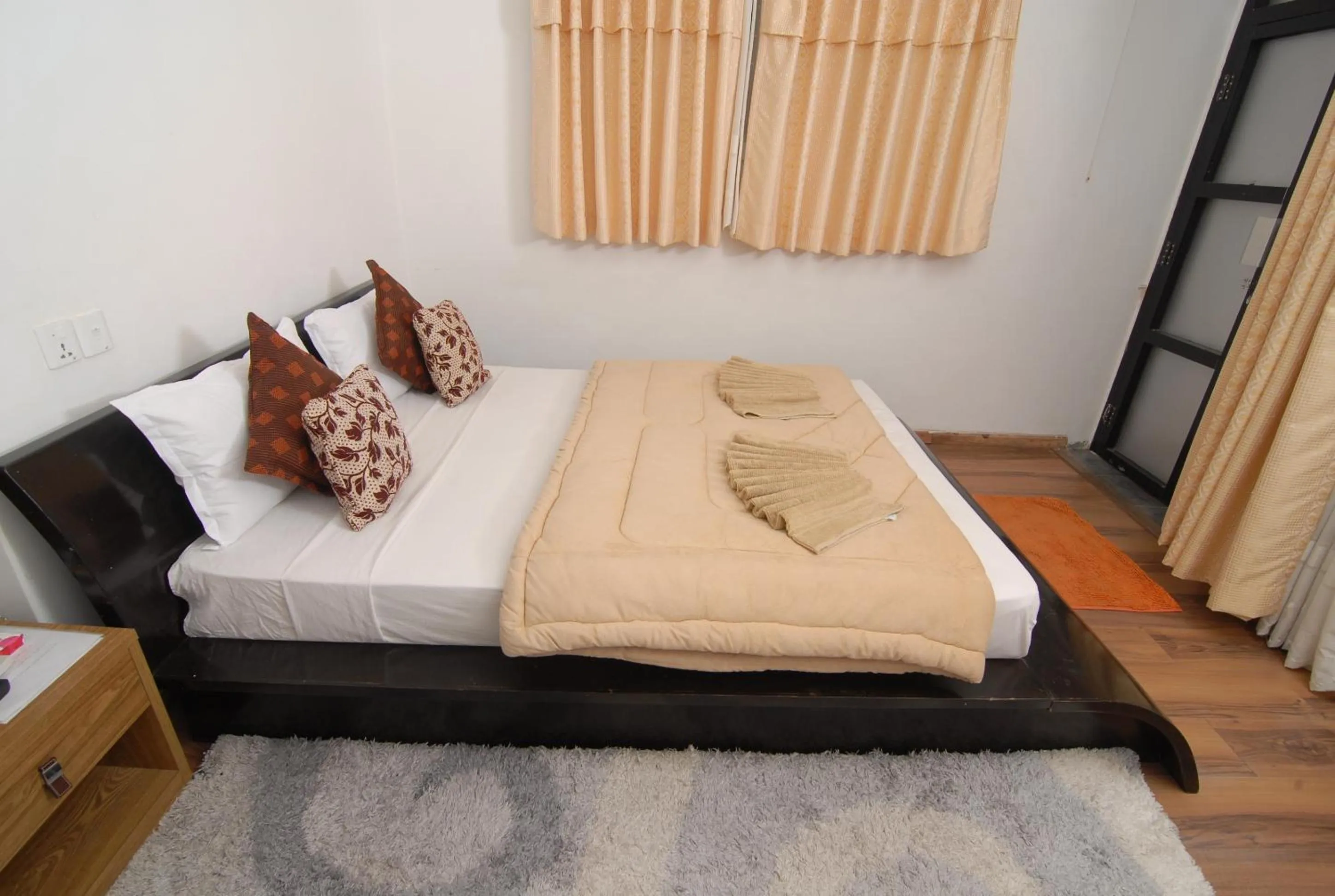 Bed in Gantavya Resort