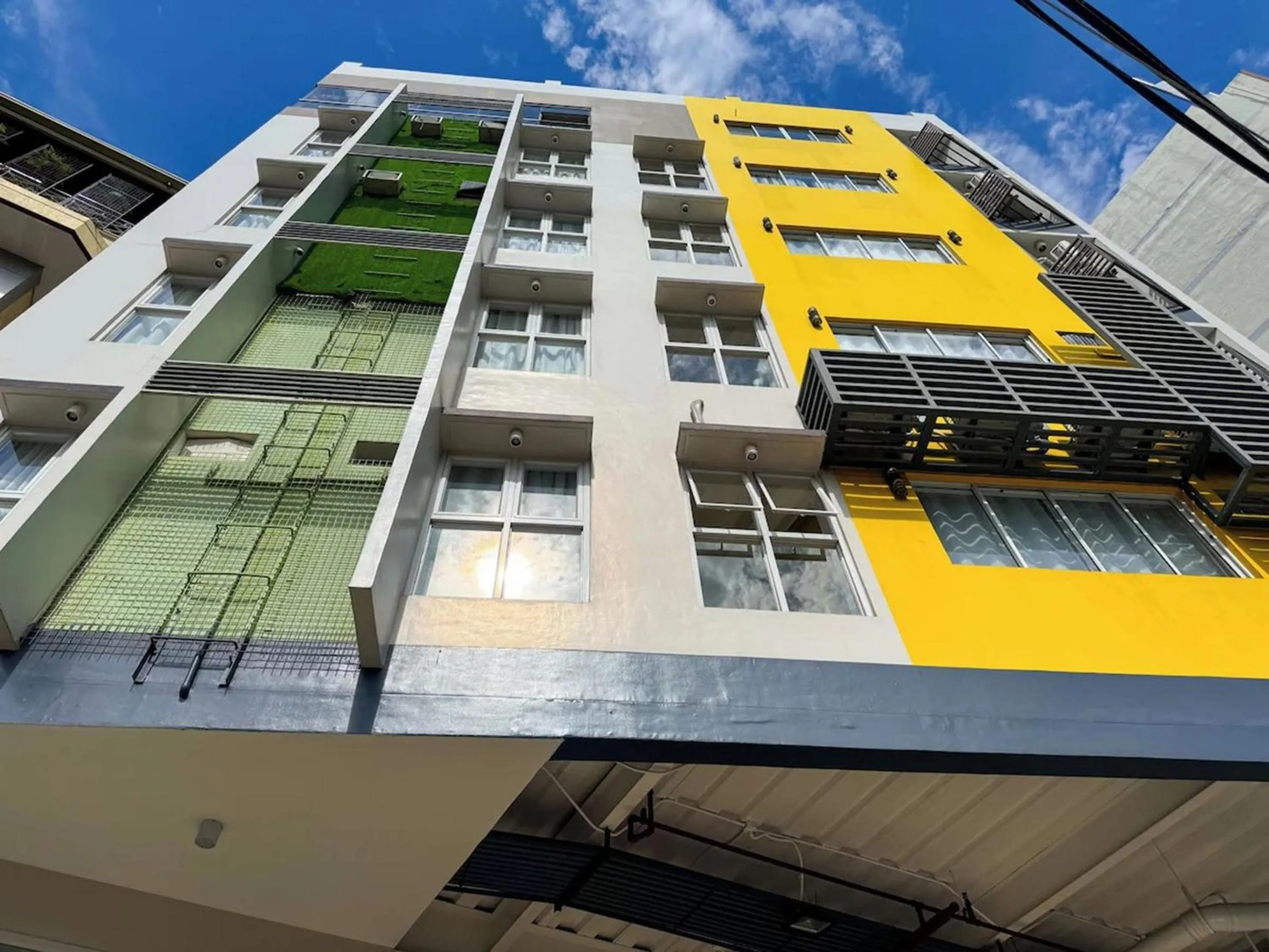 Property building in Almond Suites Cebu powered by Cocotel