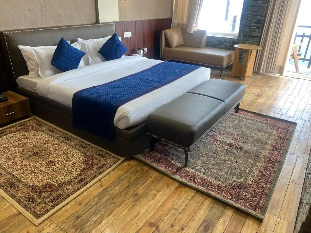 Bedroom, Bed in Hotel Wood Winds - A Best Valley View Hotel Bedroom, Bed in Hotel Wood Winds - A Best Valley View Hotel