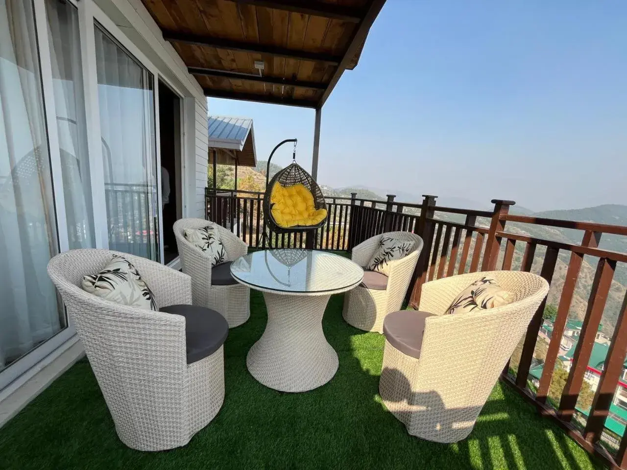 Balcony/Terrace in Hotel Wood Winds - A Best Valley View Hotel Balcony/Terrace in Hotel Wood Winds - A Best Valley View Hotel
