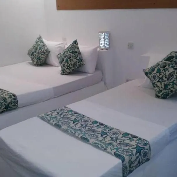 Bed in Varadero Zanzibar Hotel