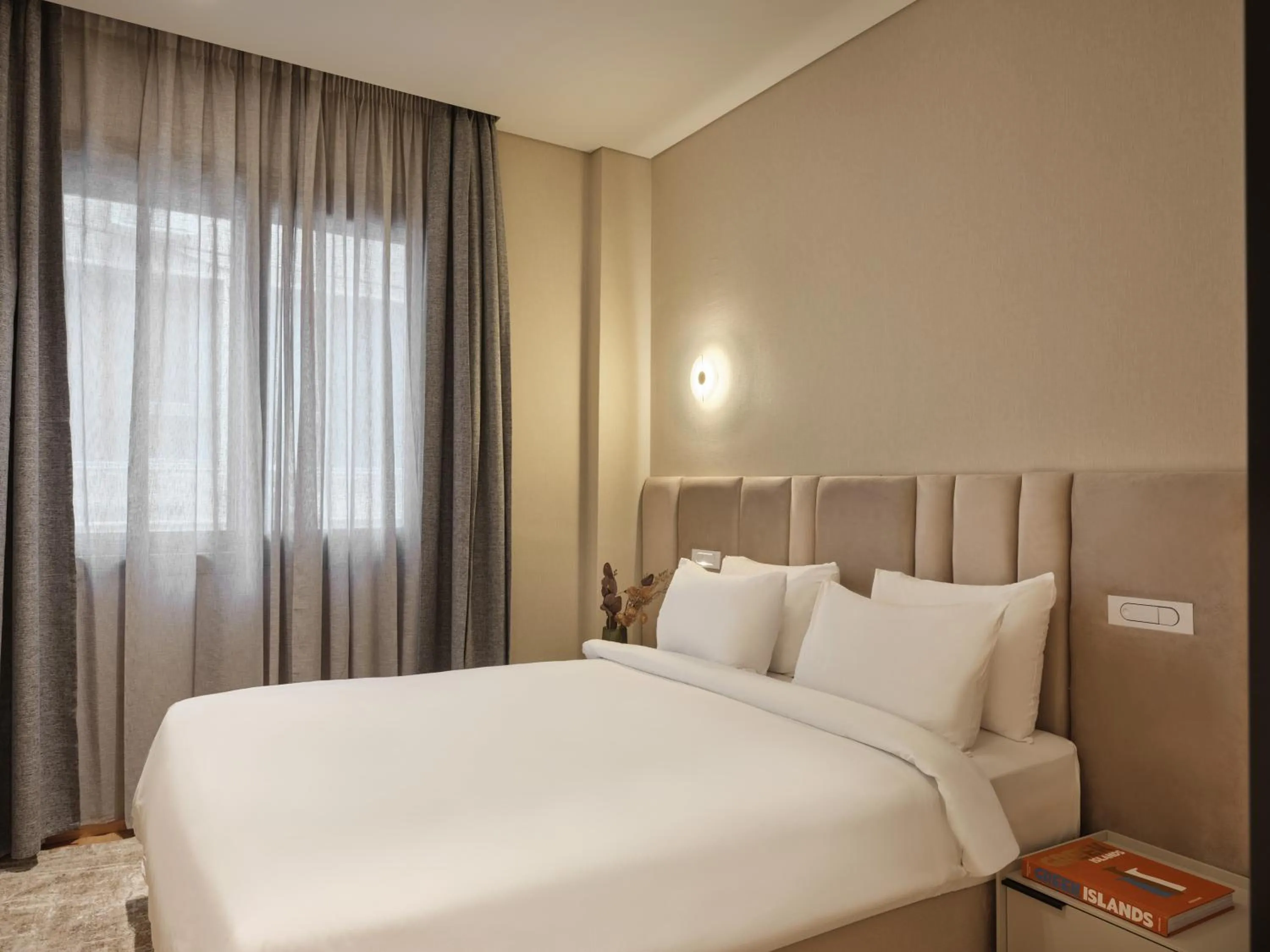 Bed in Nur Outline Aparthotel